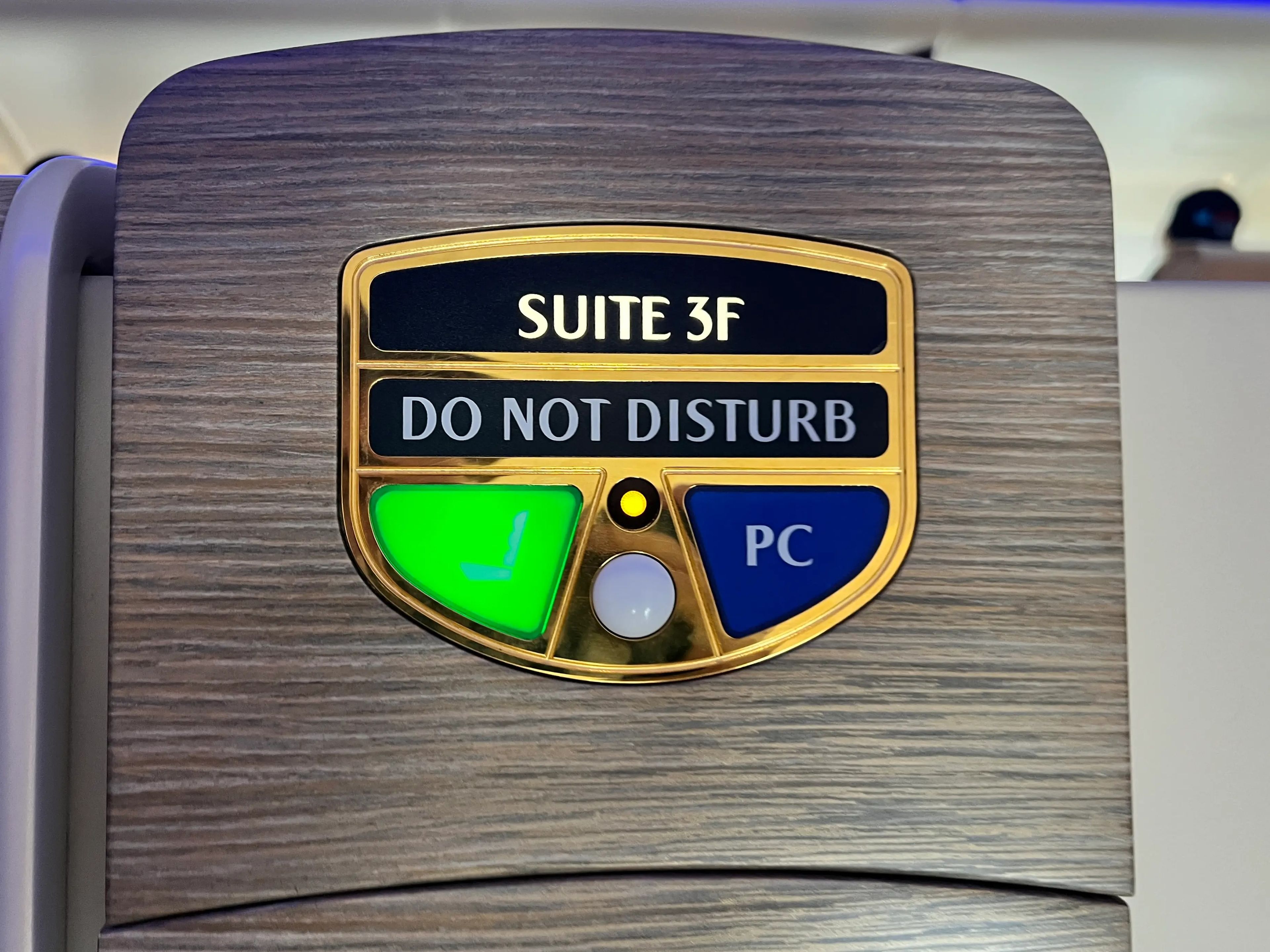 The do not disturb sign and seat number on Emirates A380 first class