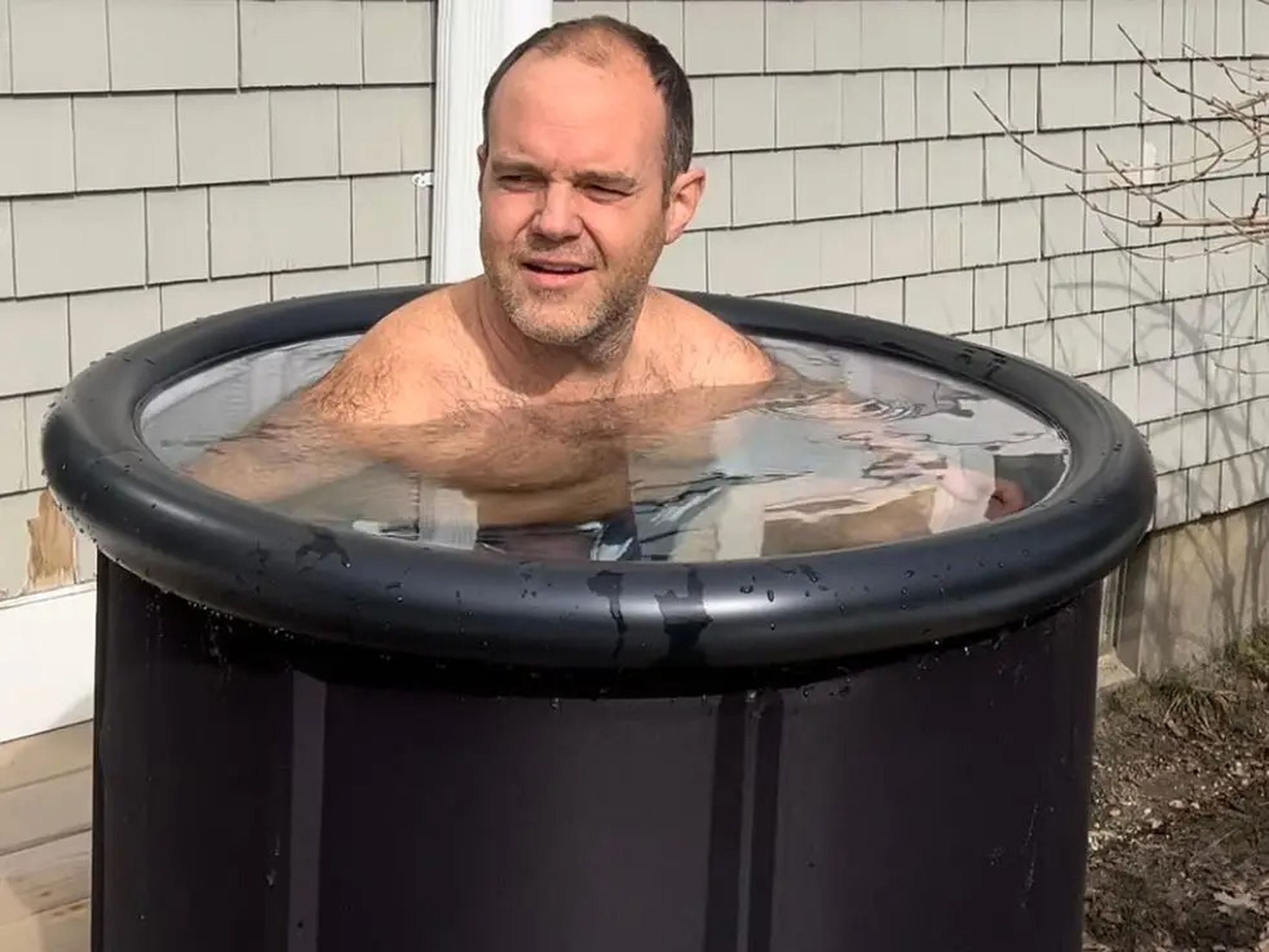 Man sitting in cold plunge