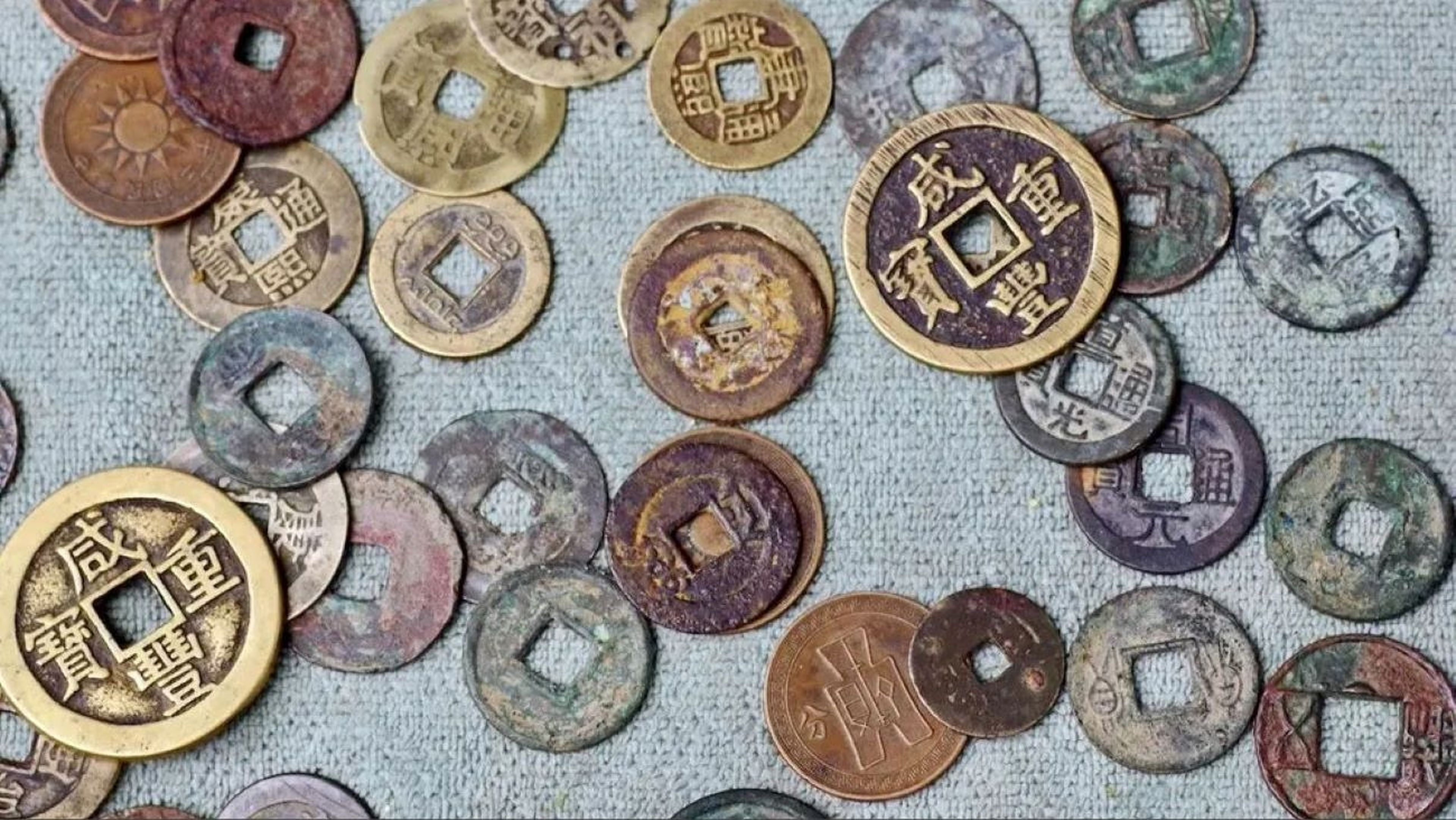 Científicos descubren en Japón un tesoro de 100.000 monedas chinas antiguas (no son las de esta foto).