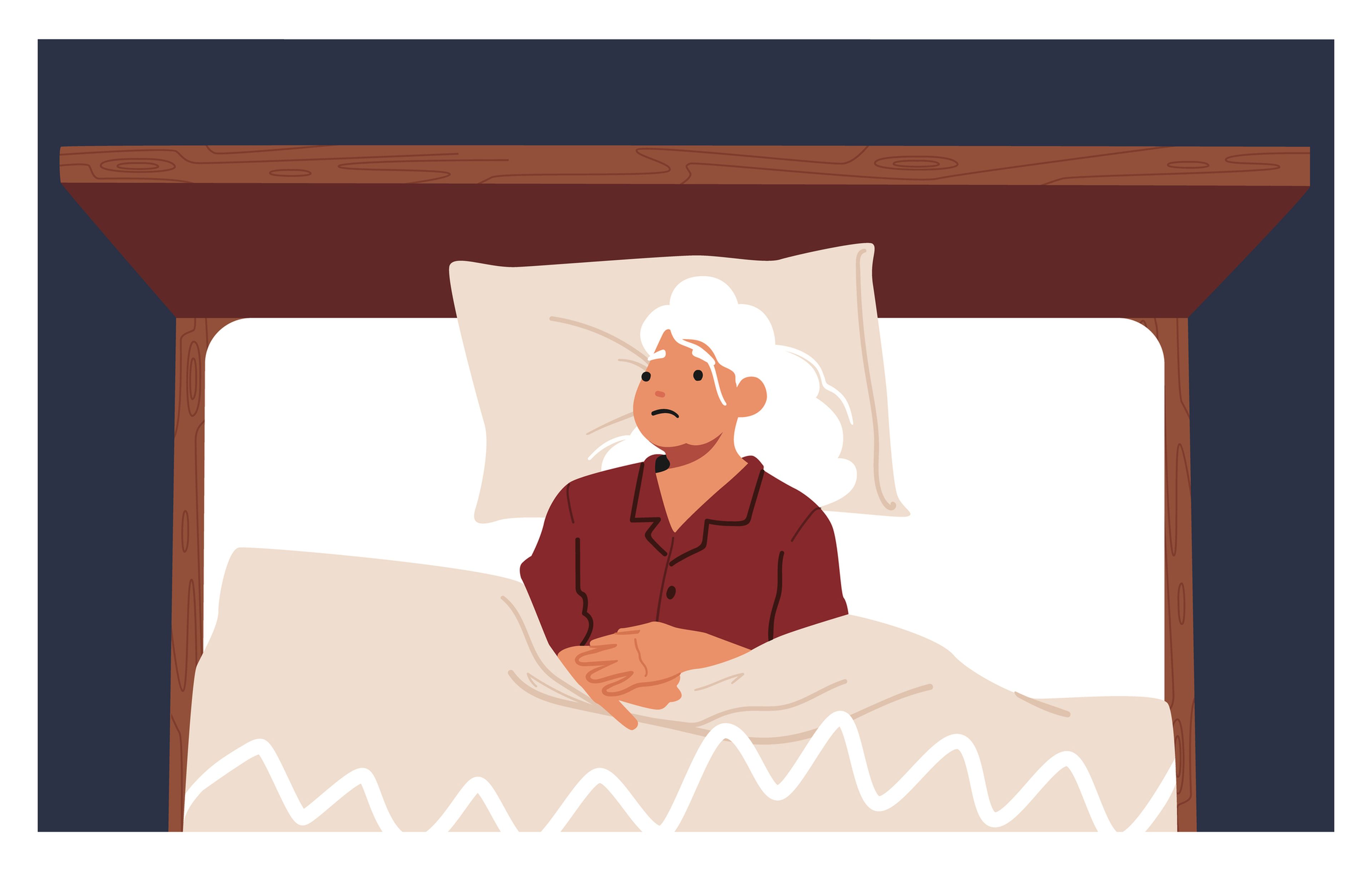 Mujer mayor en cama