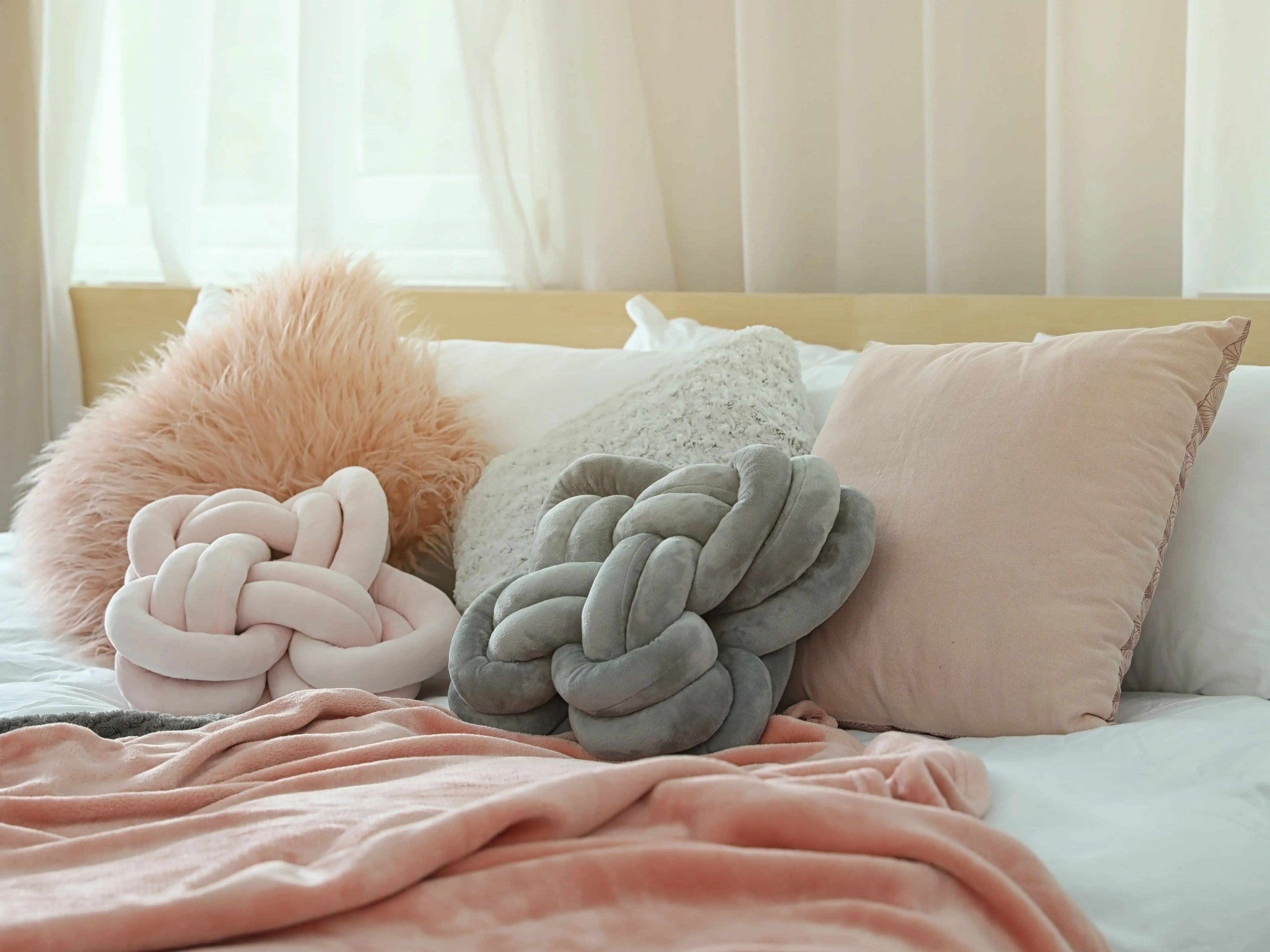 Escoge almohadas de diferentes formas, tamaños y colores.