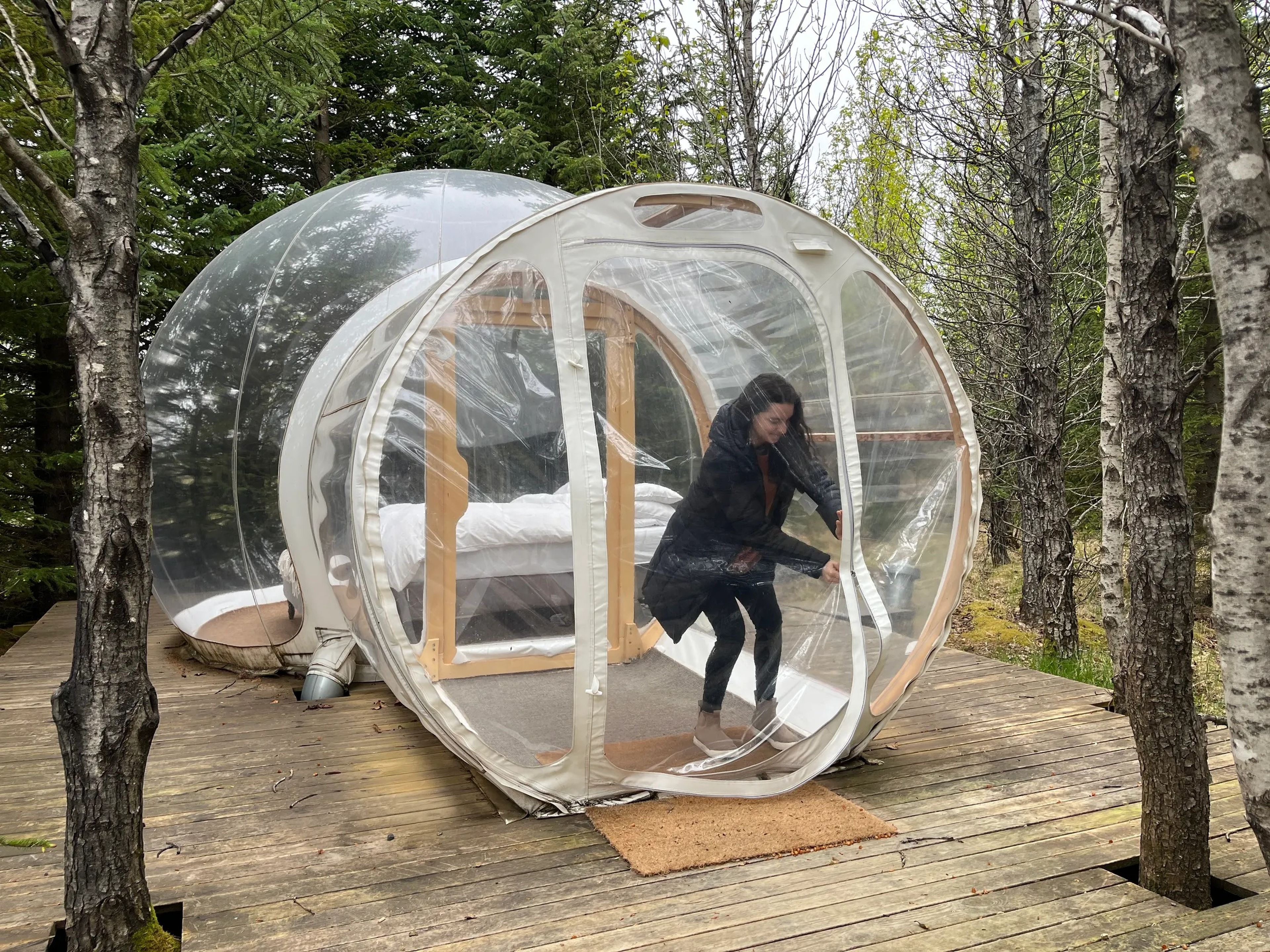 Zipping up a bubble at the Bubble Hotel in Iceland.