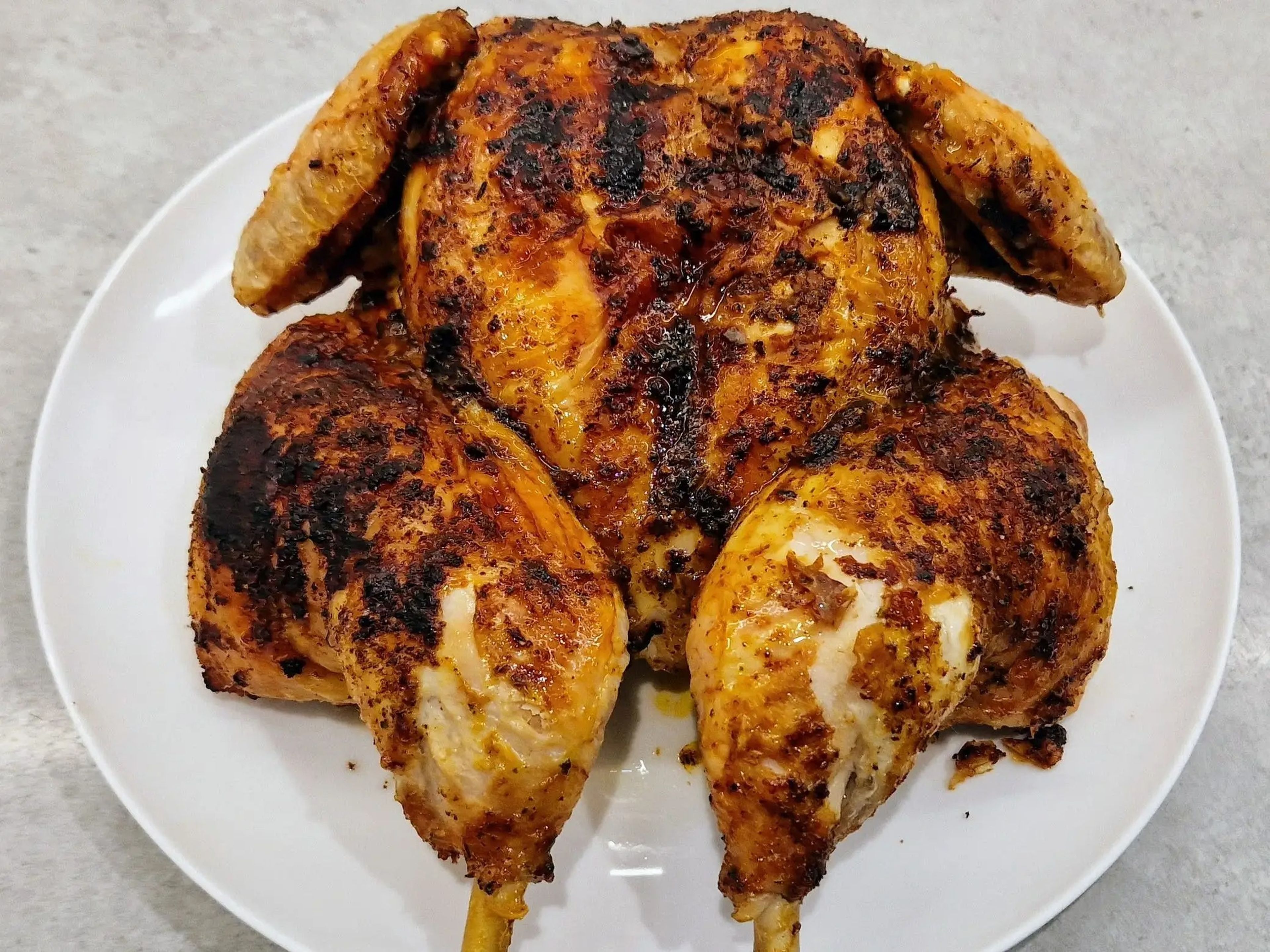 roasted whole chicken on a plate