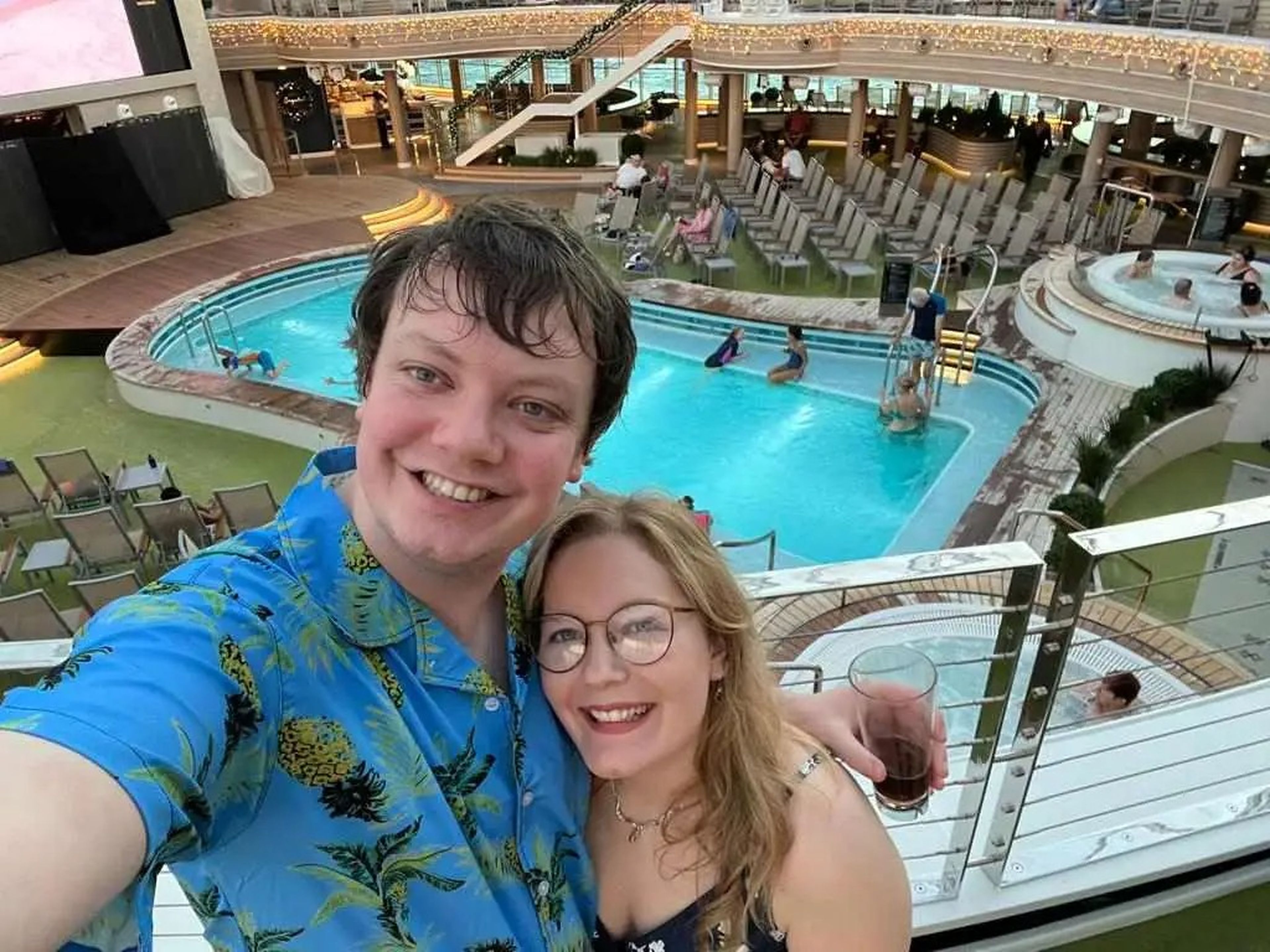 The author and her partner are pictured on P&O's Arvia cruise ship