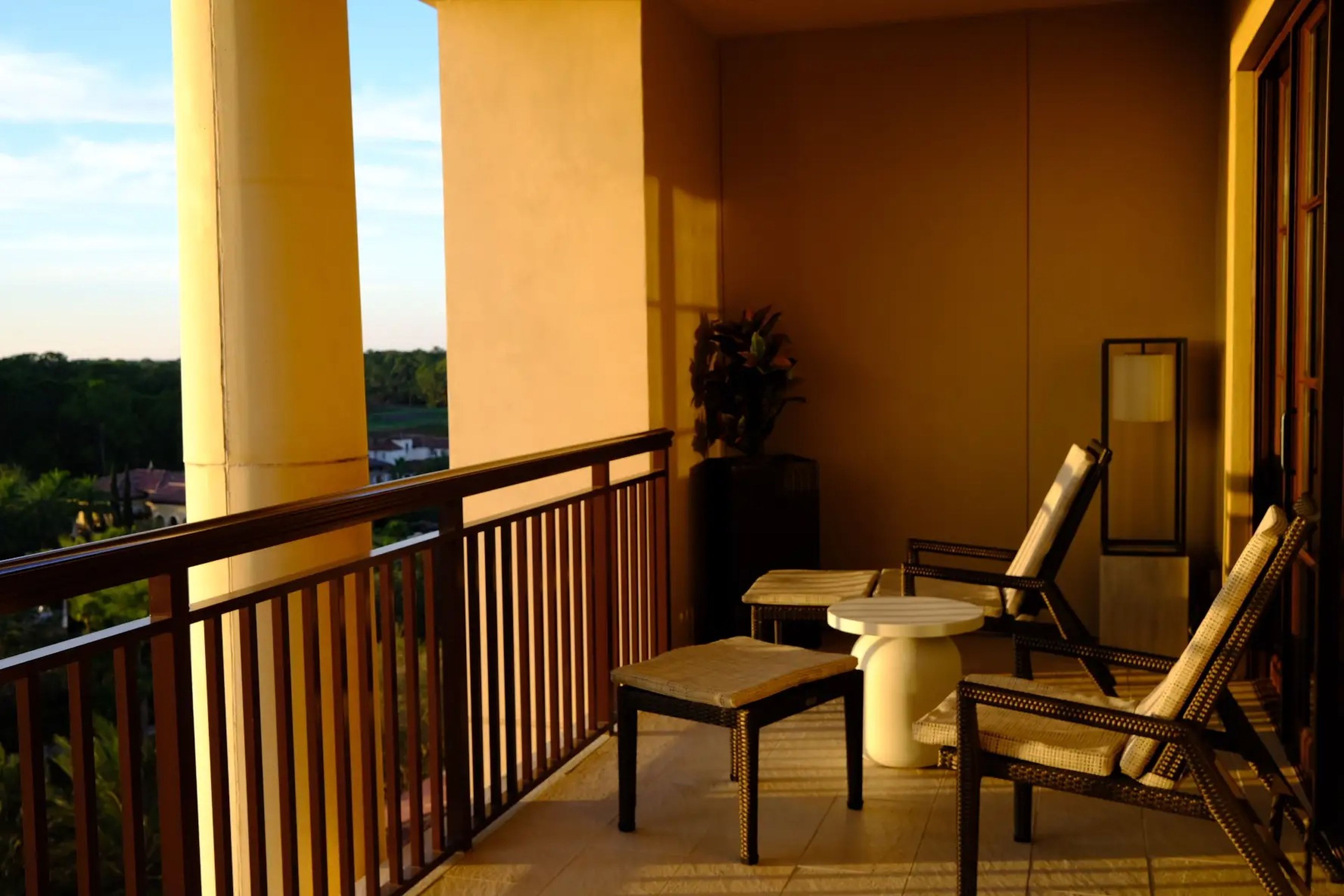 Chairs and balcony in Disney World Four Seasons room