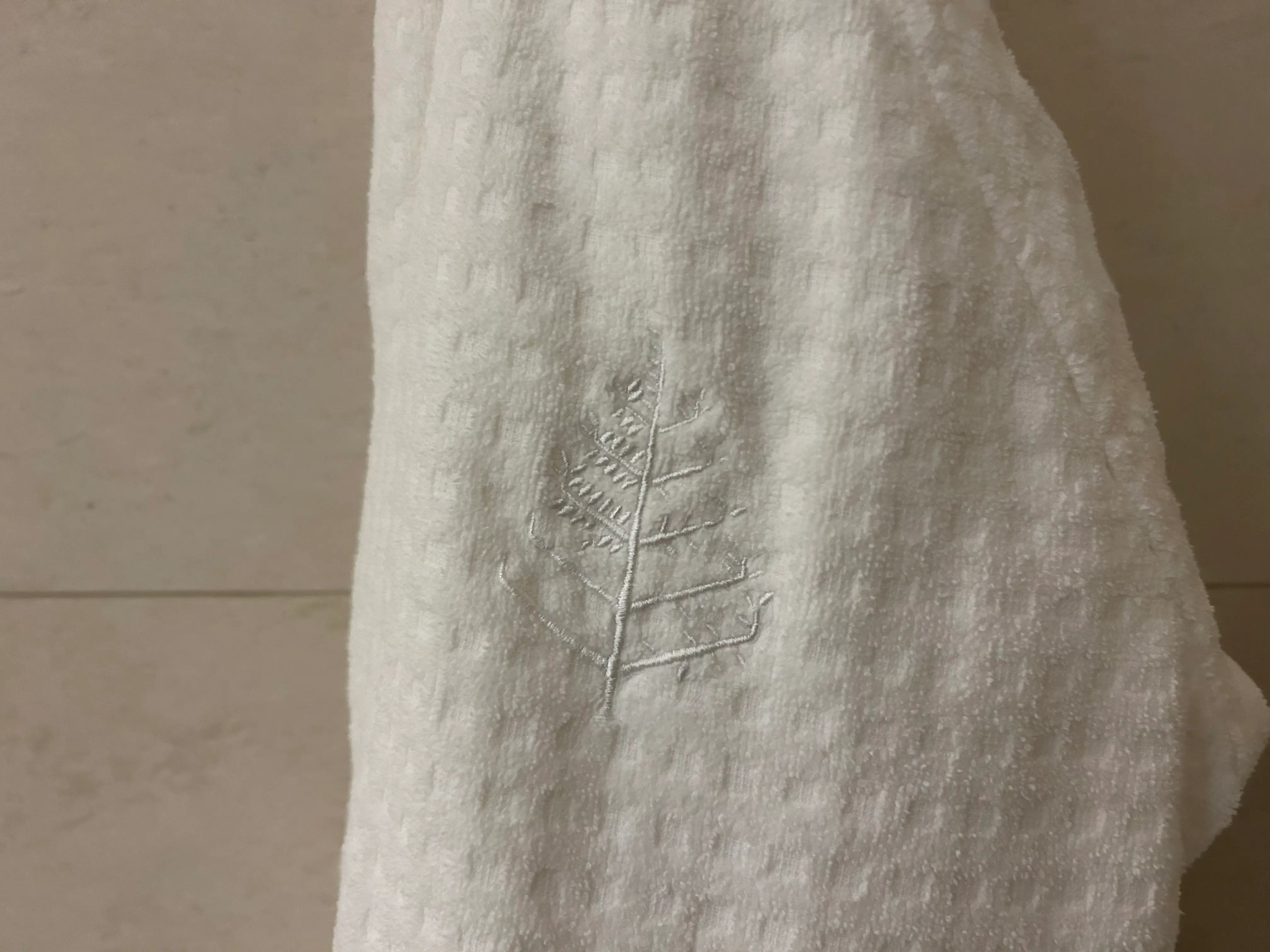 Design imprinted on towel in Disney World Four Seasons room 