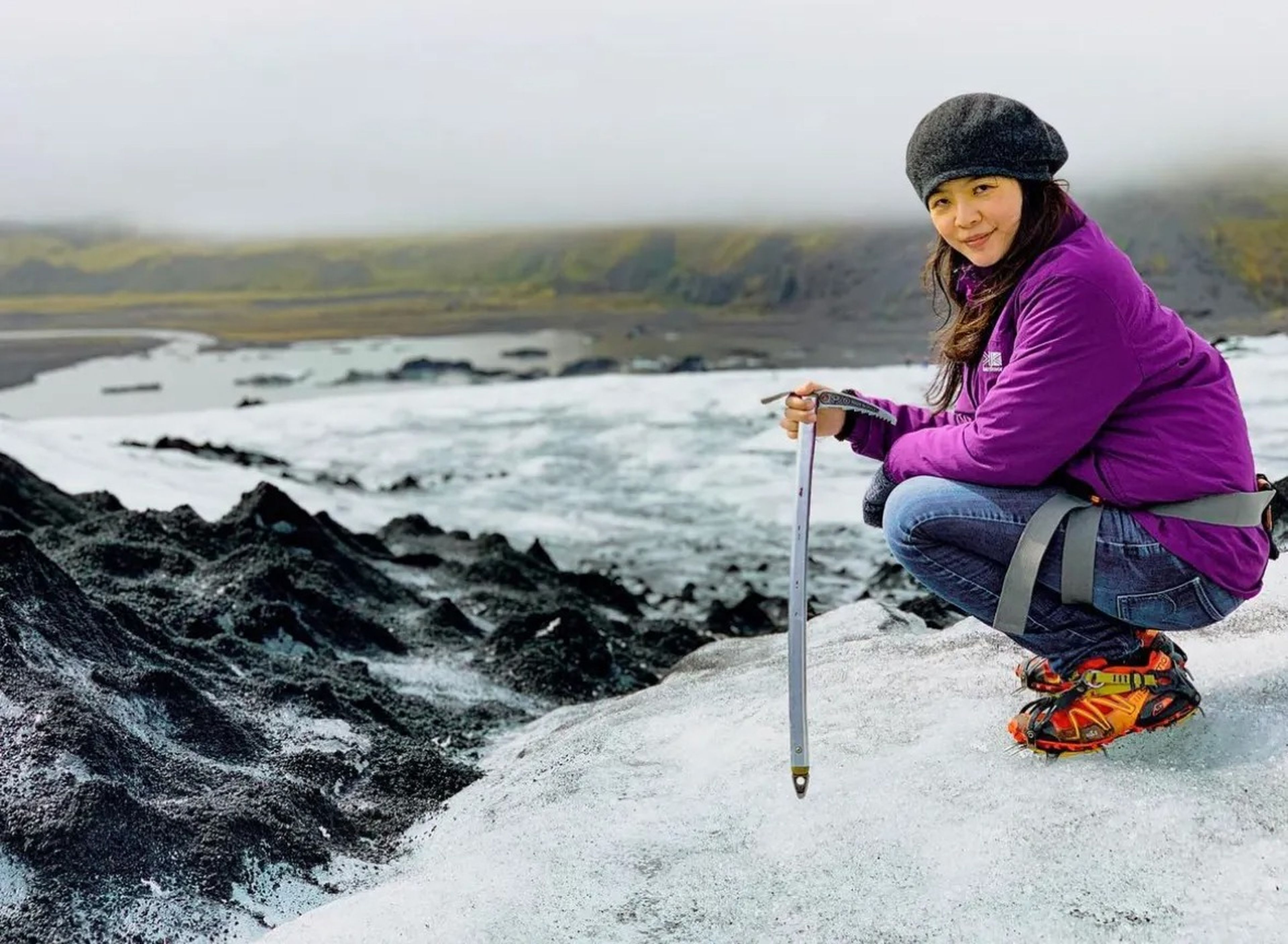 Ex-lawyer Ling Yah Wong glacier hiking at the Sólheimajökull Glacier in Iceland.