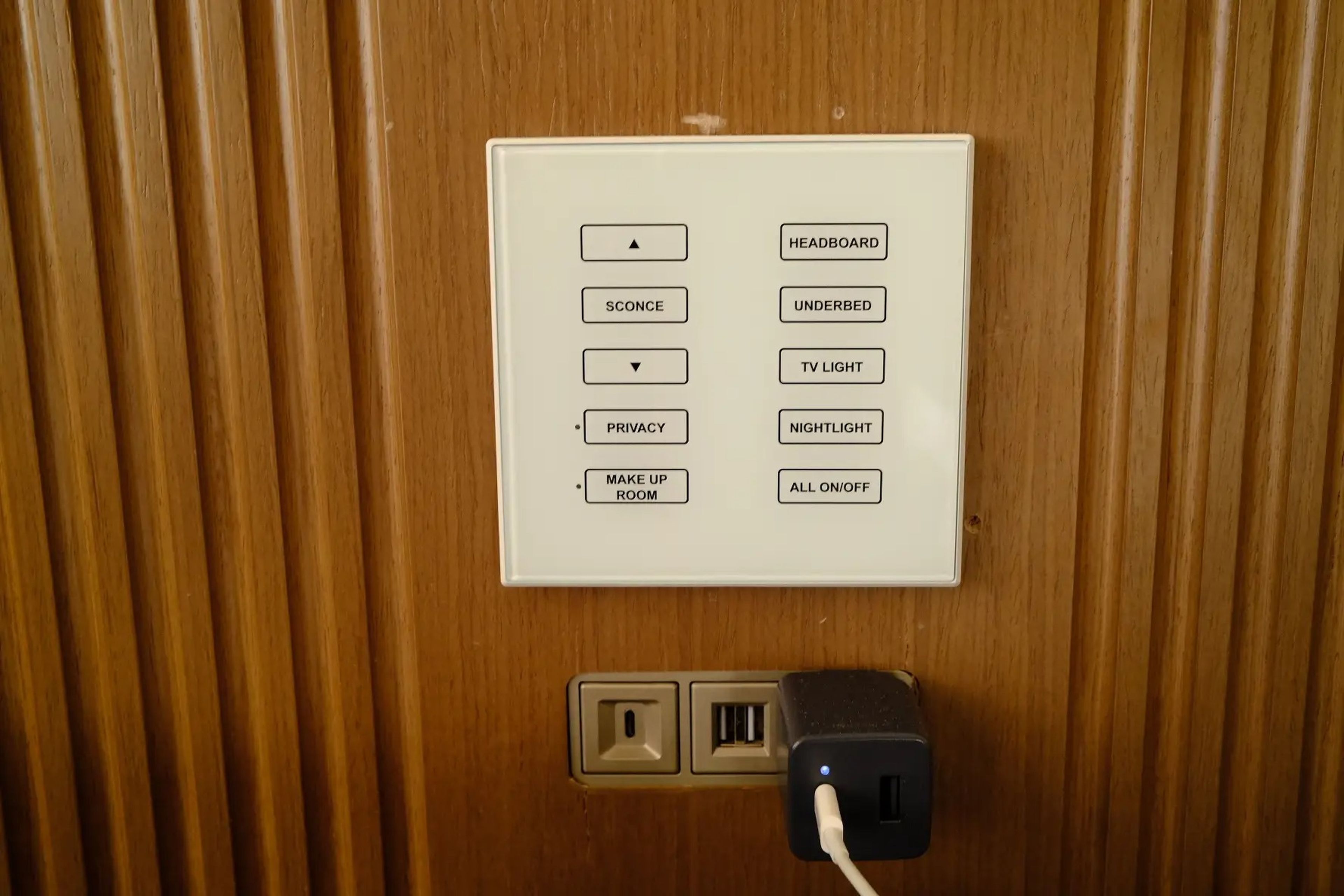 Panel of buttons to control lights in Disney World Four Seasons room 
