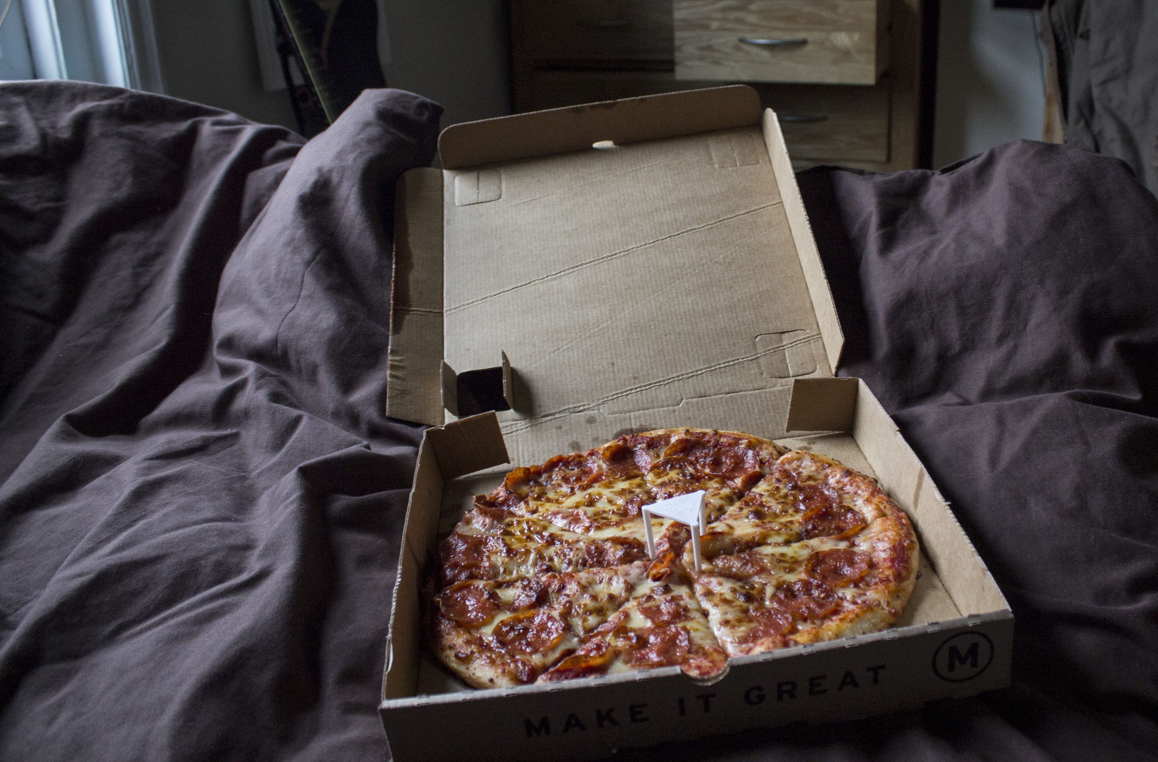 Pizza en cama