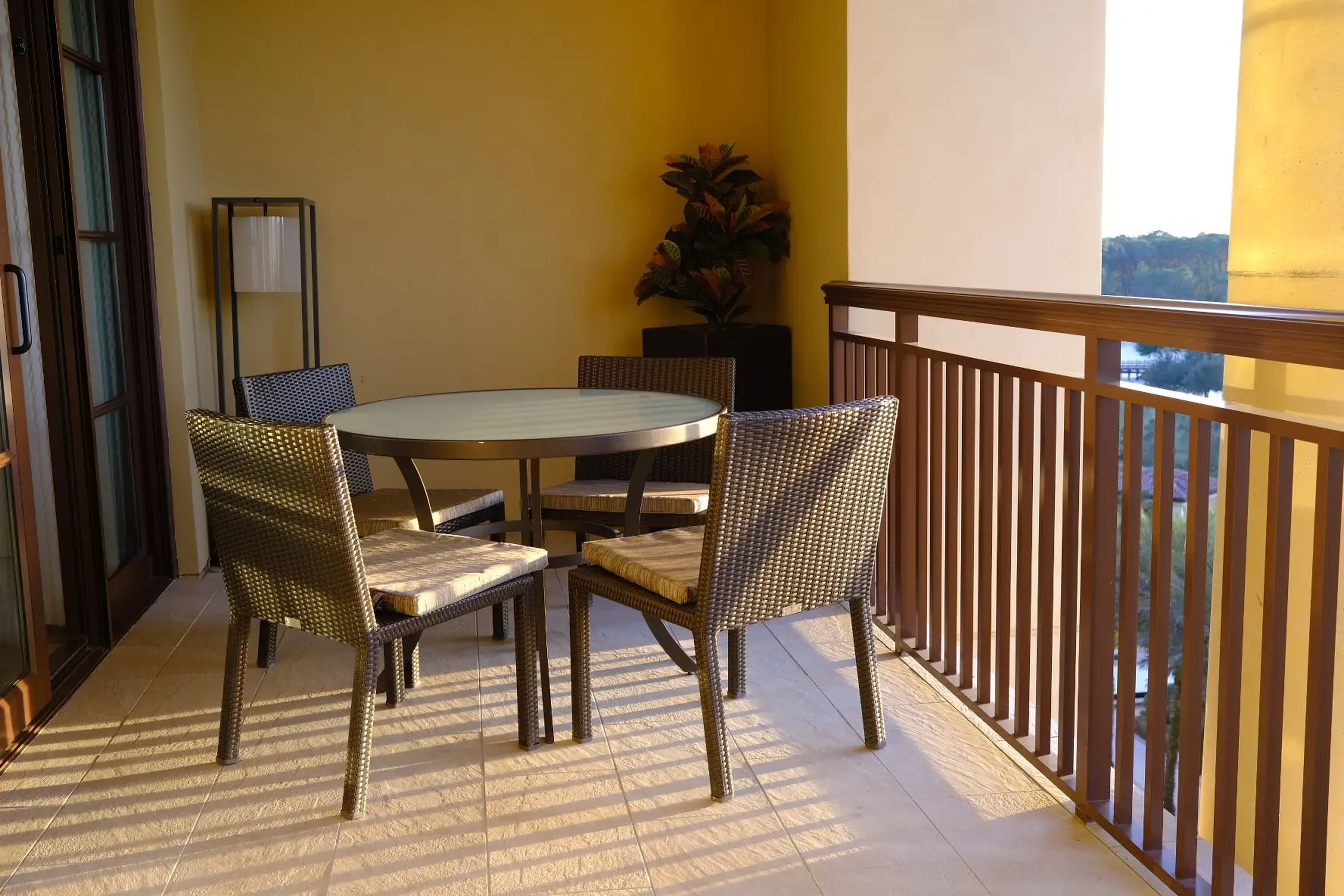 Table and chairs on Disney World Four Seasons room balcony
