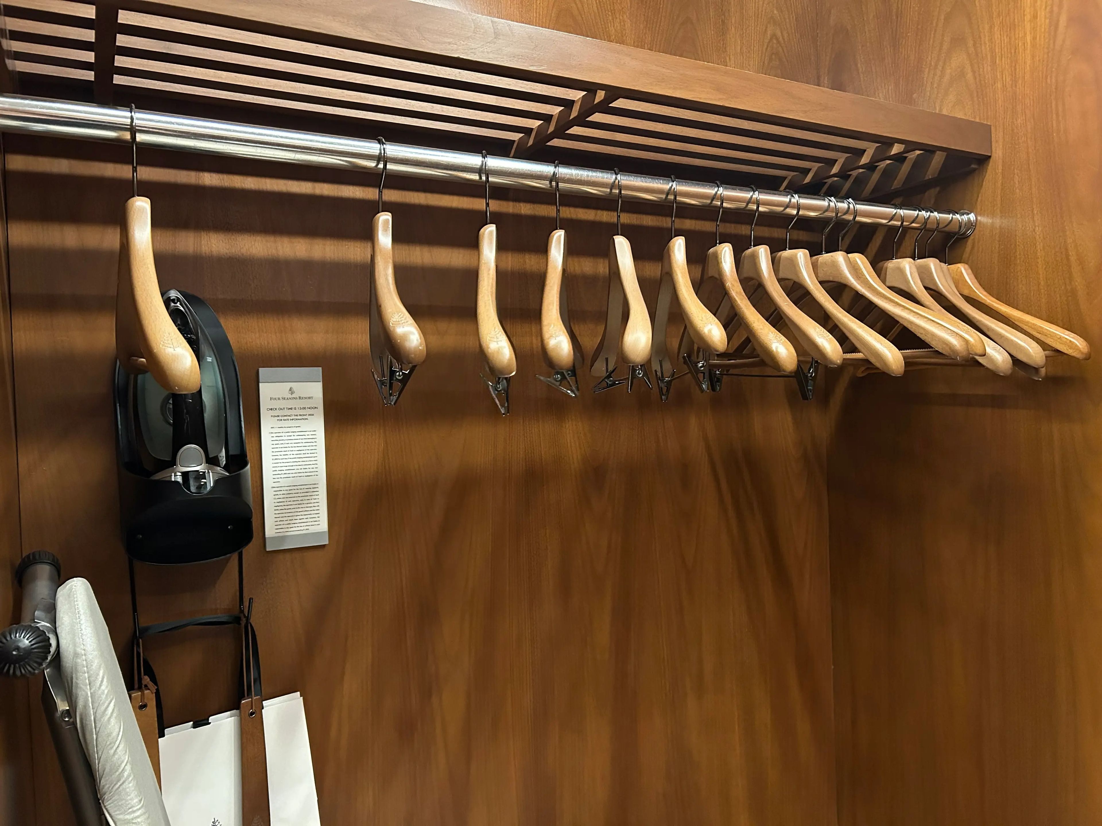 Wooden hangers in closet in Disney World Four Seasons suite