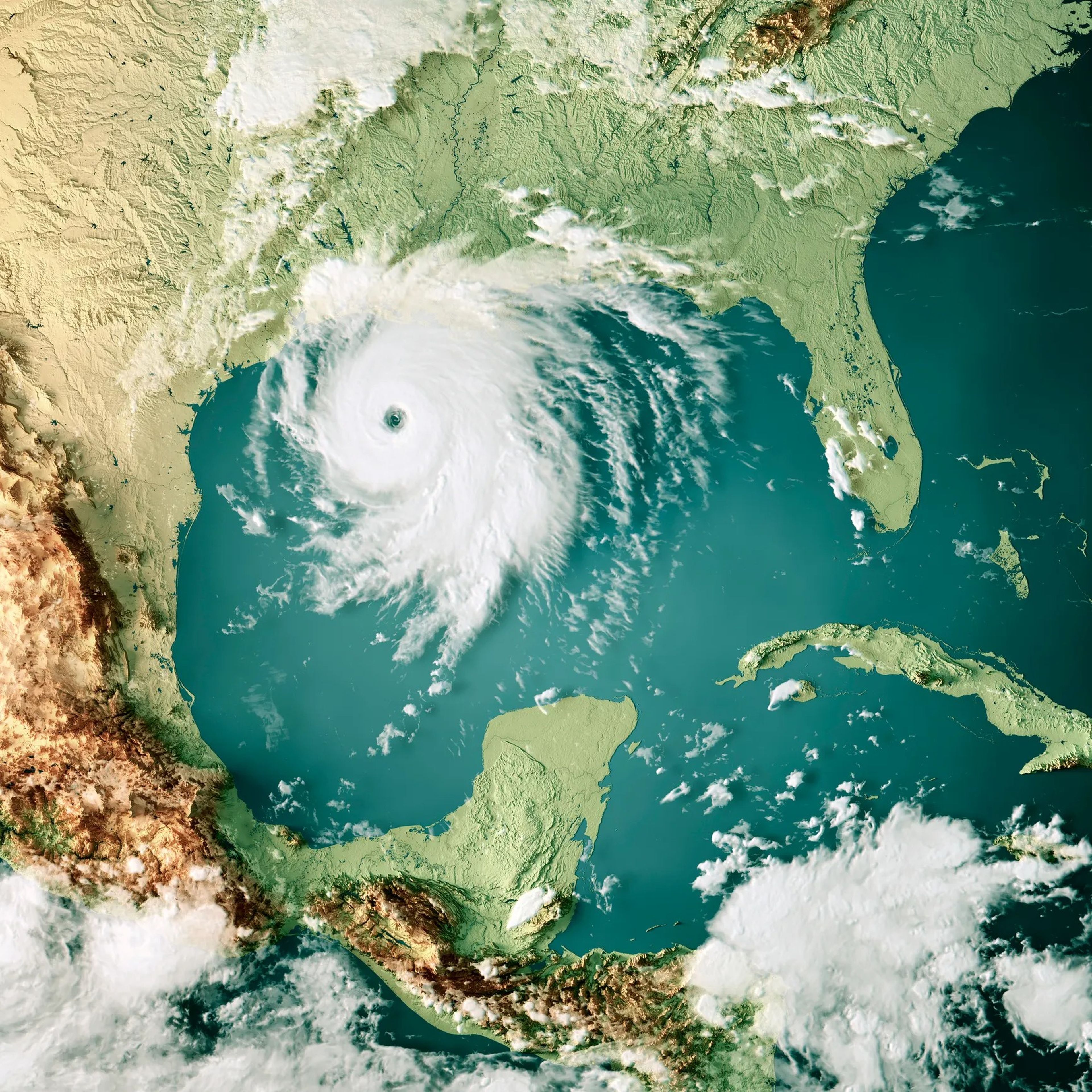 A hurricane shown from overhead approaching landfall in southern US.