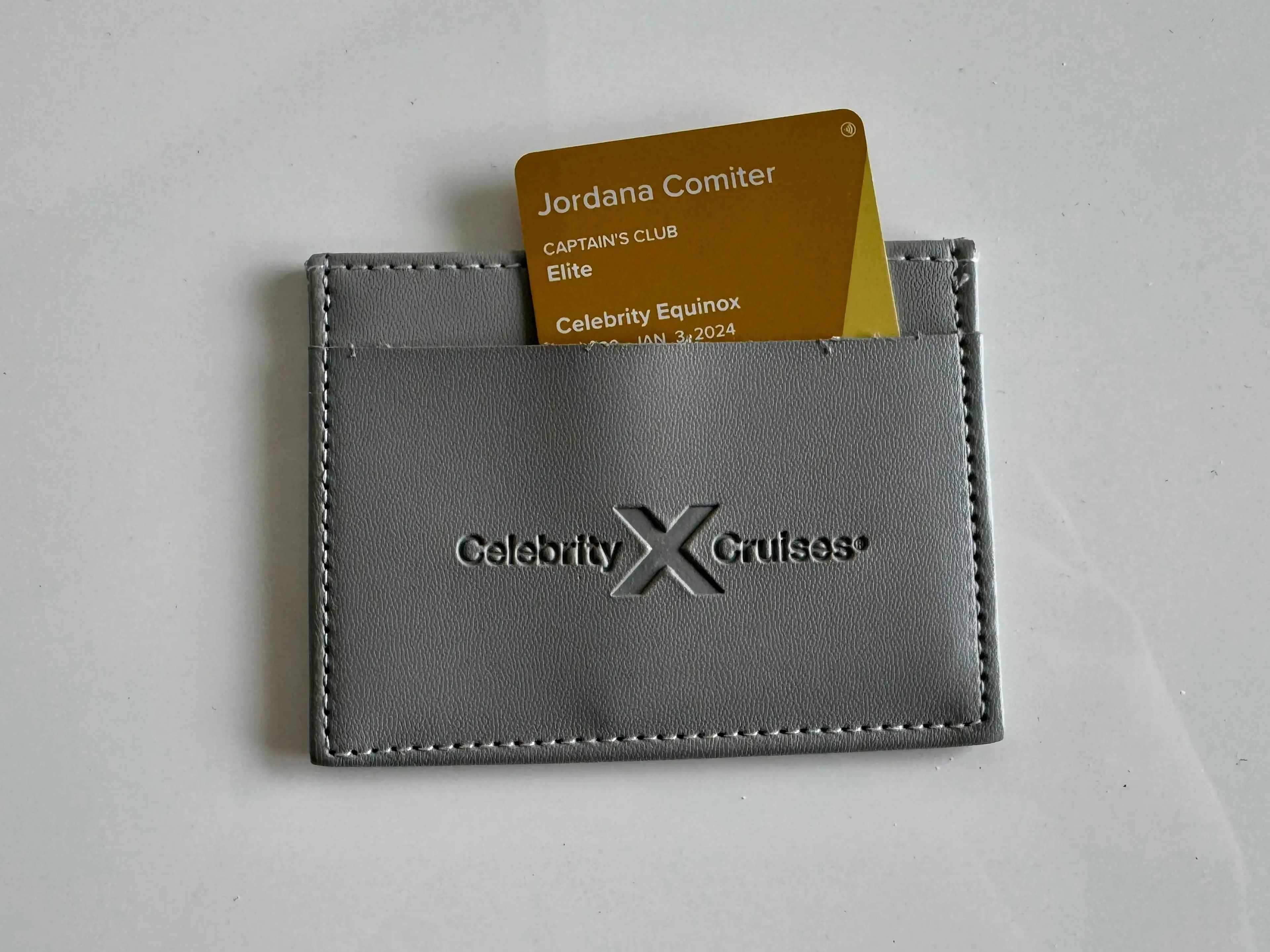 jordana's cruise card sticking out of a small wallet
