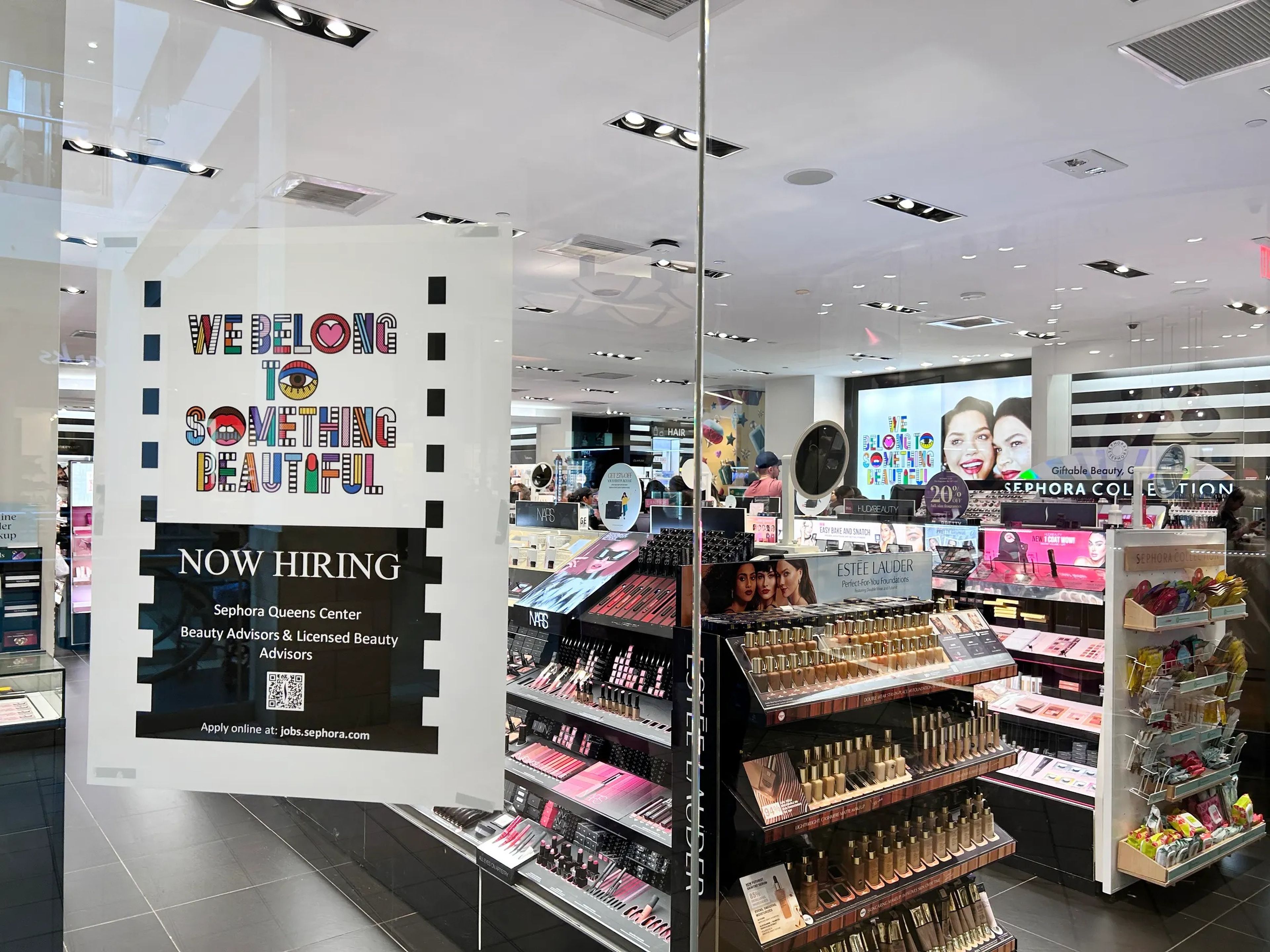"now hiring" sign posted outside of Sephora