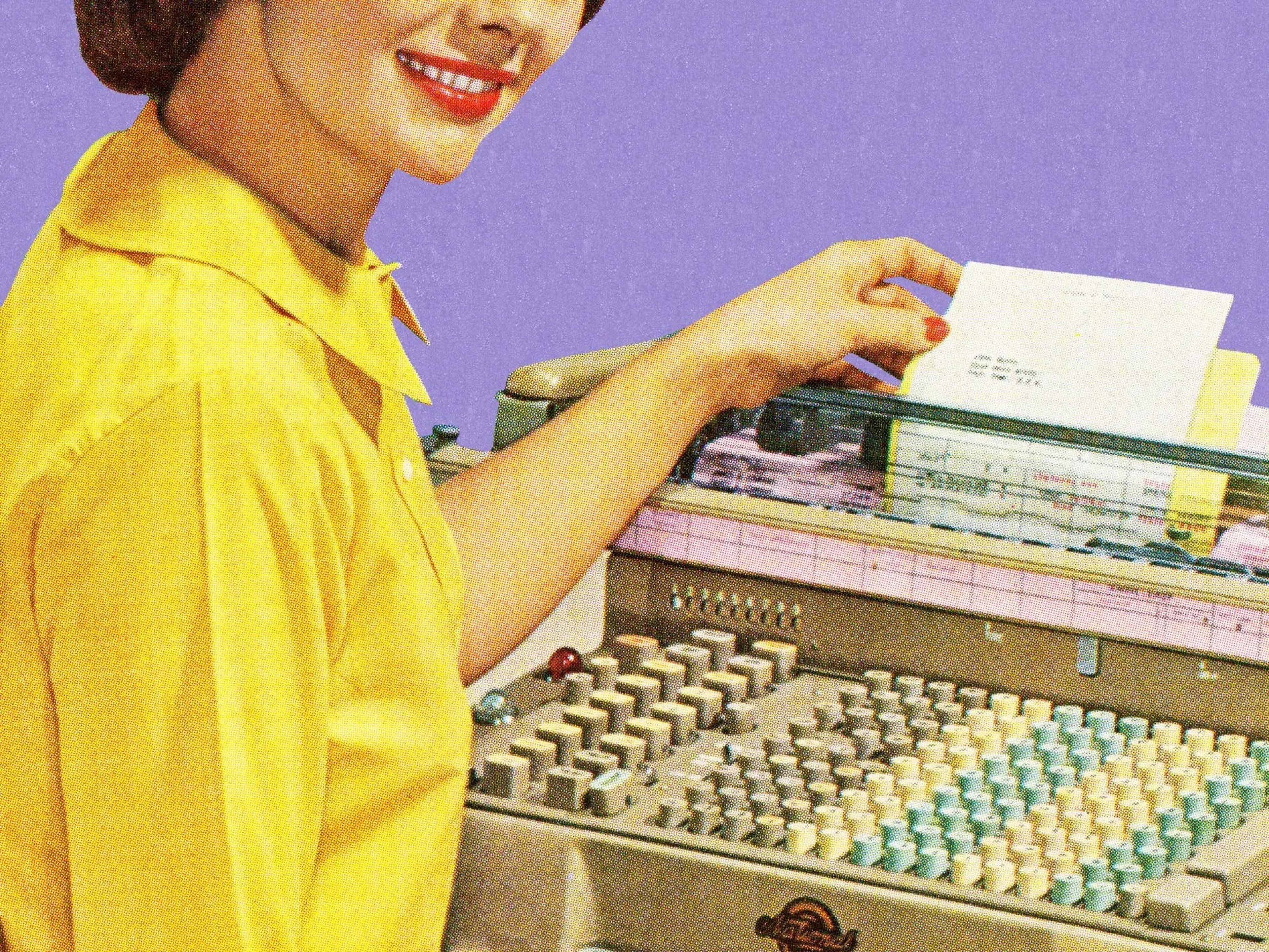 Vintage image of a woman using office equipment.