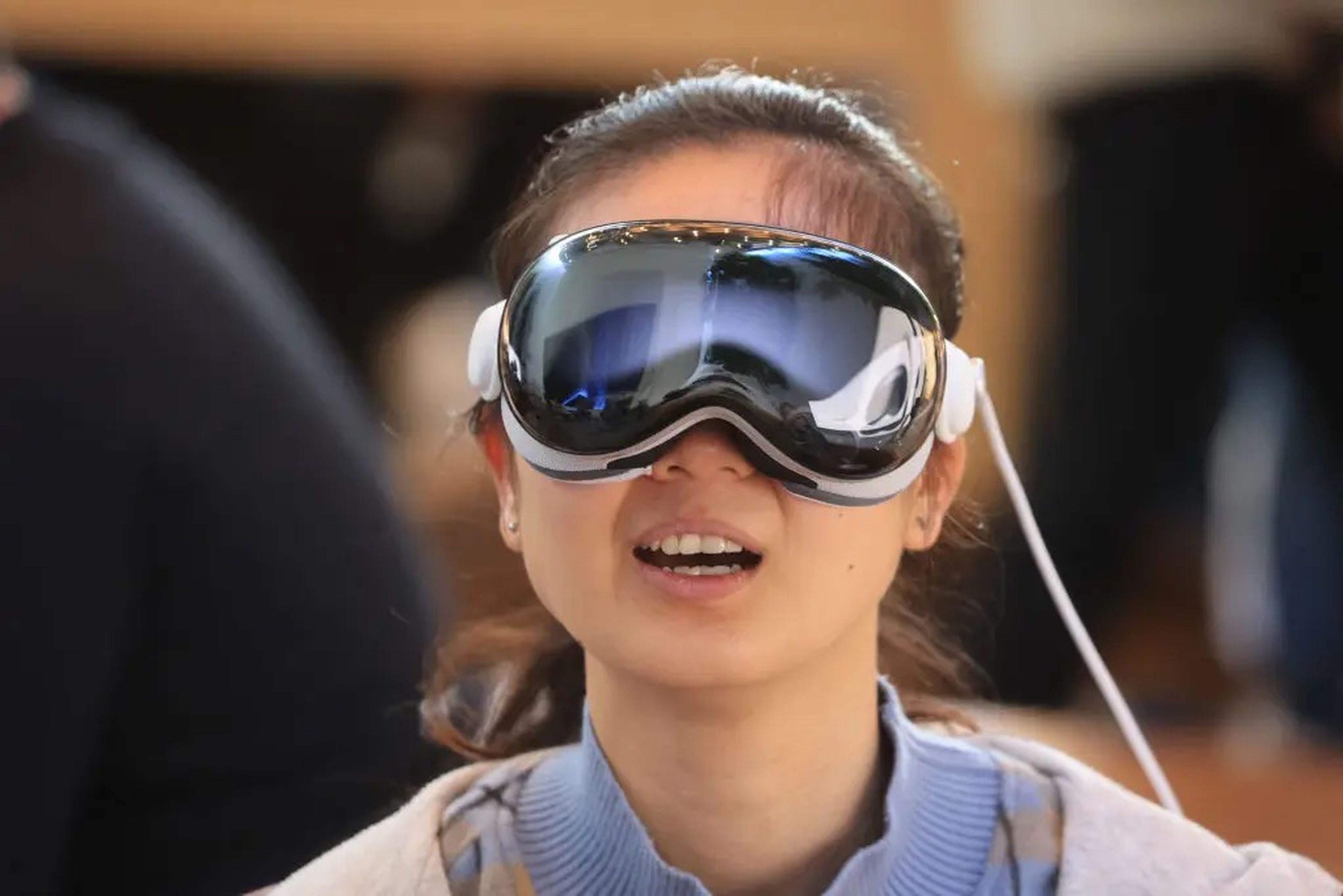 woman wearing an apple vision pro headset