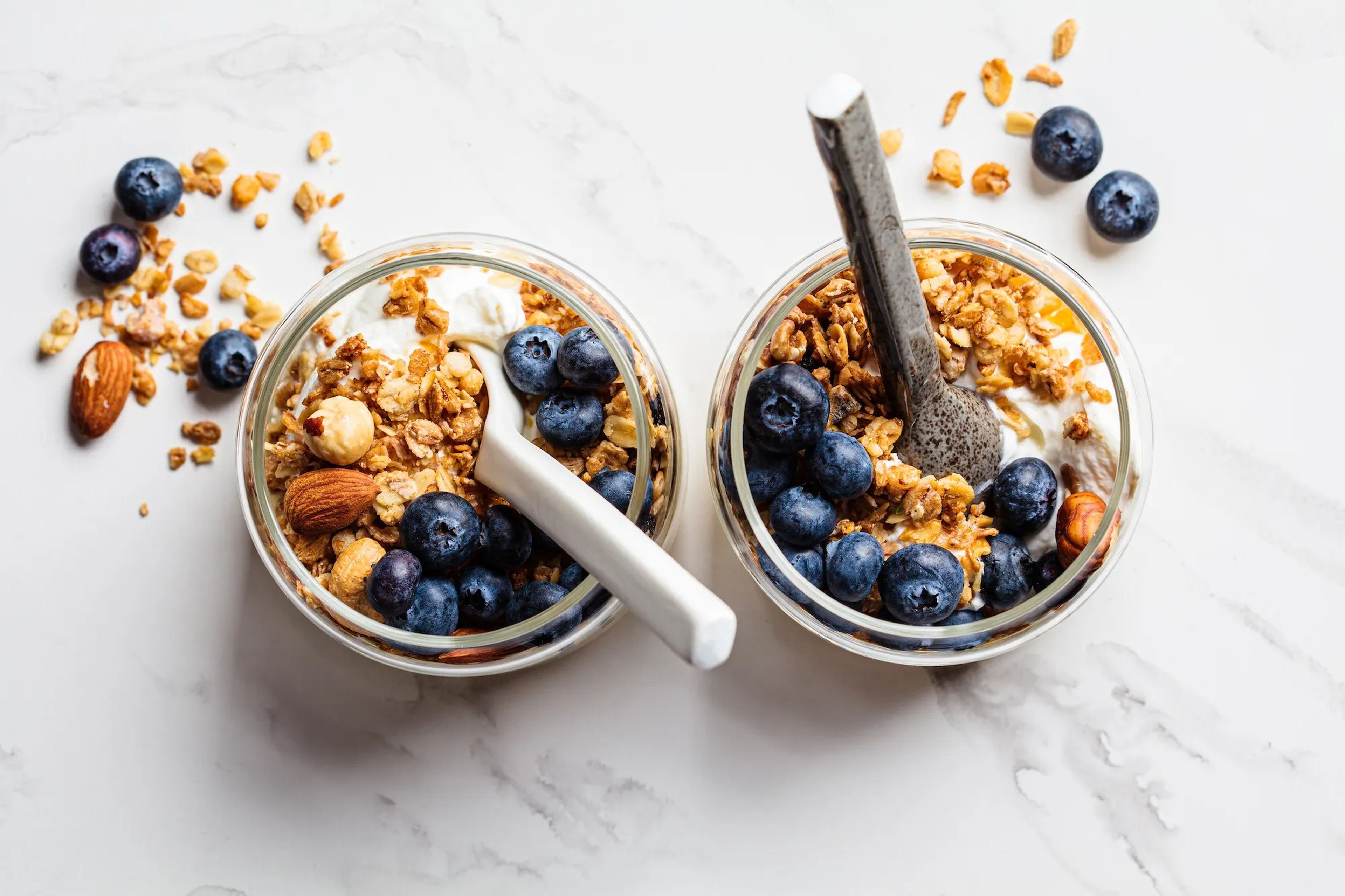 Yogurt with granola, nuts, and fruit
