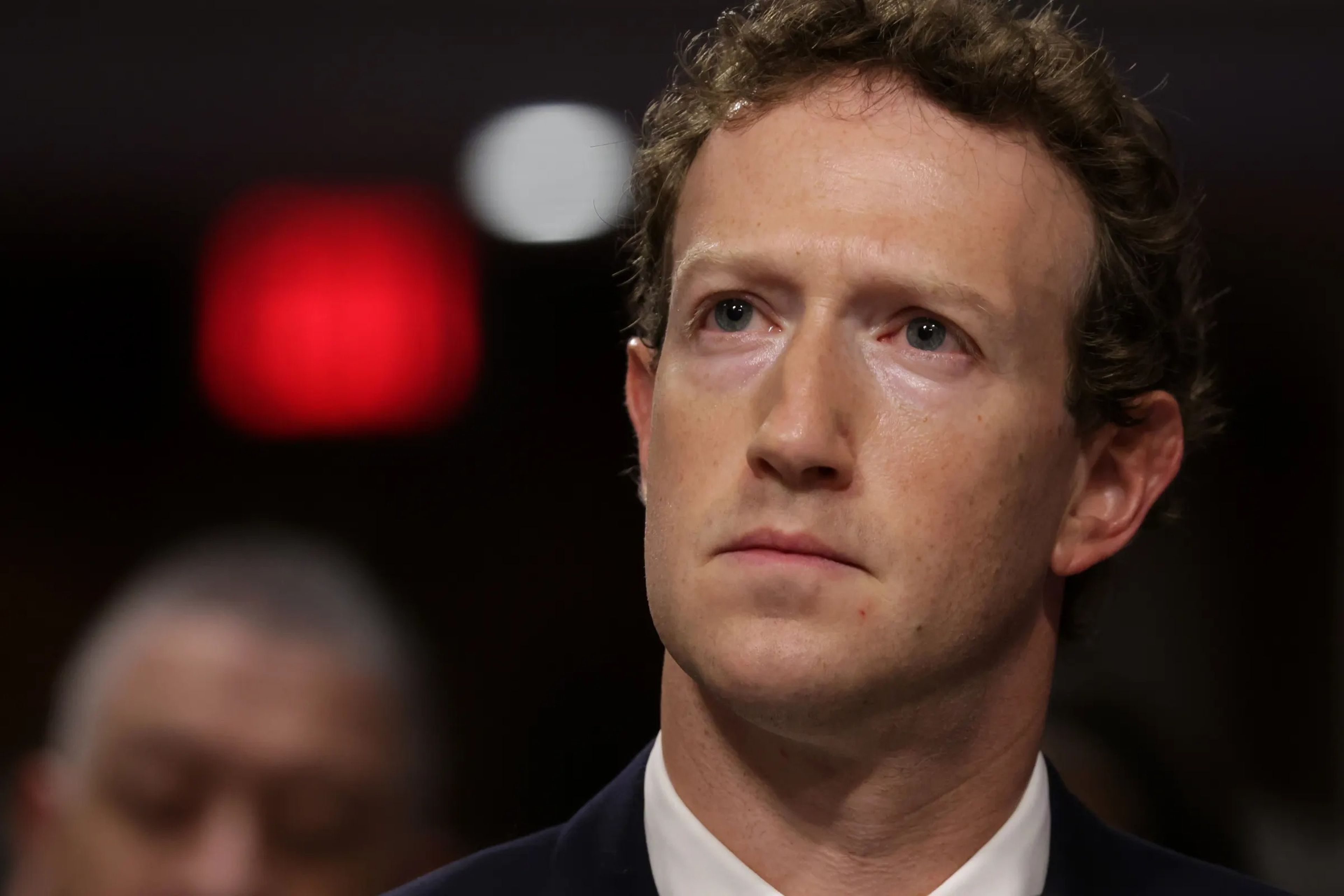 Close up shot of Mark Zuckerberg looking intensely at court hearing