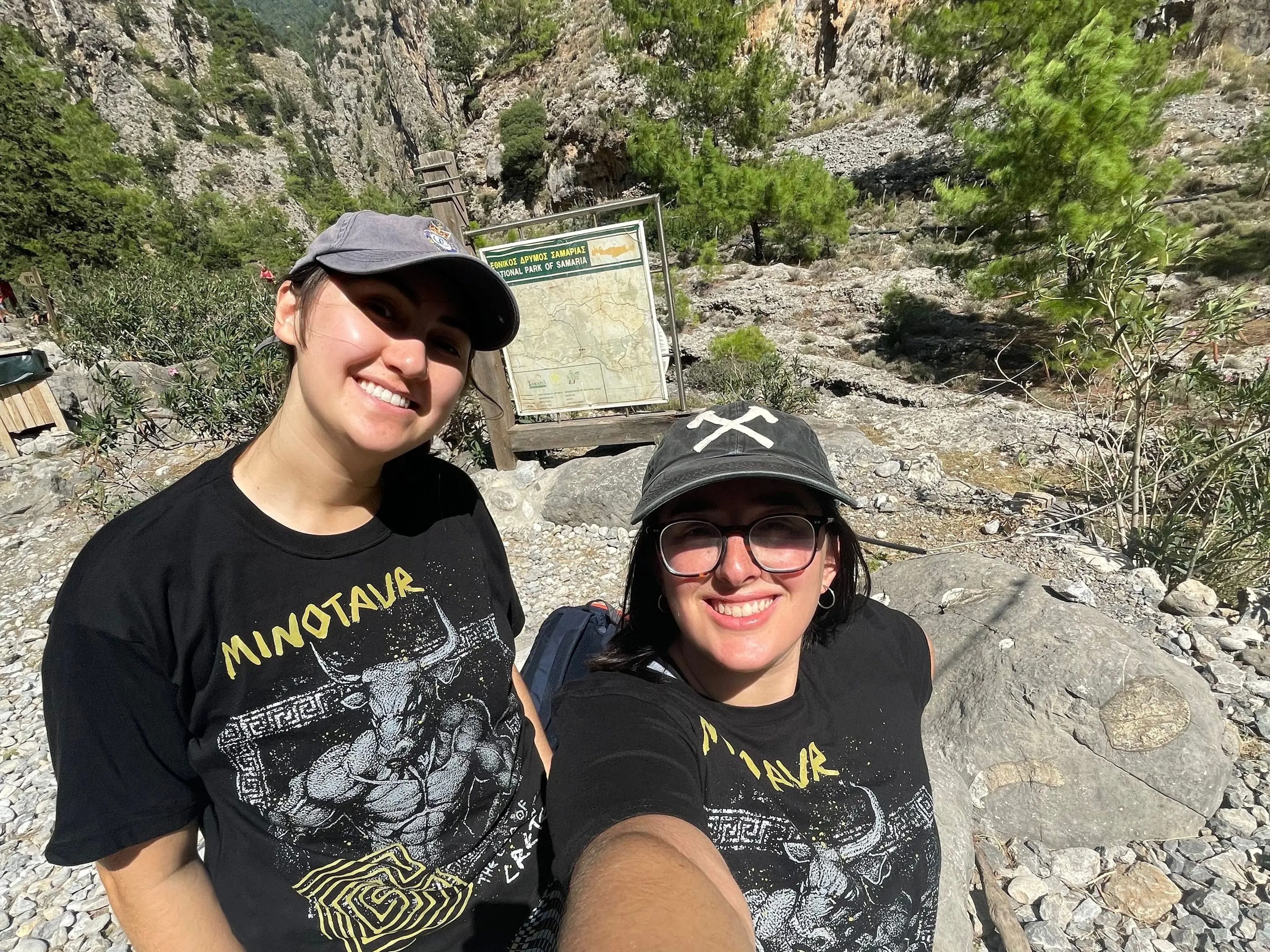 hannah and a friend posing for a selfie at a trail head for samaria George in create greece