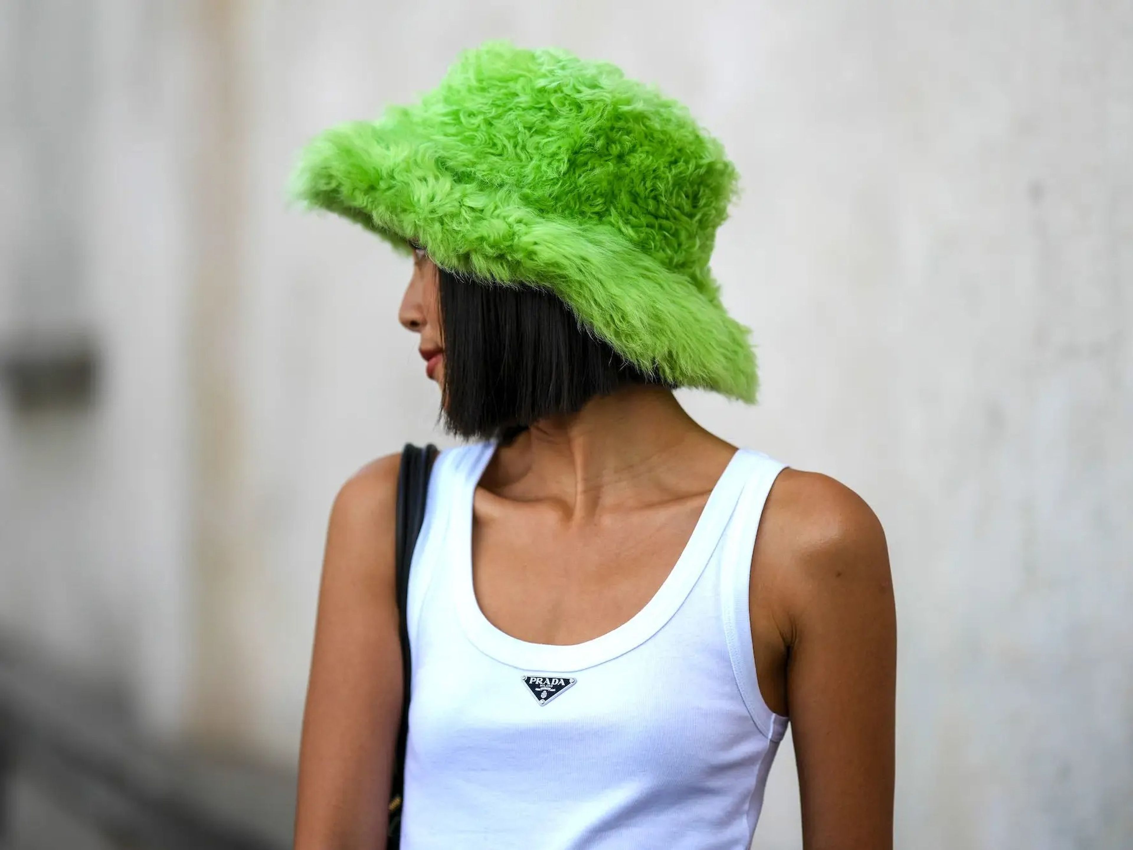 Influencer Molly Chiang wears a Prada tank top in Milan.