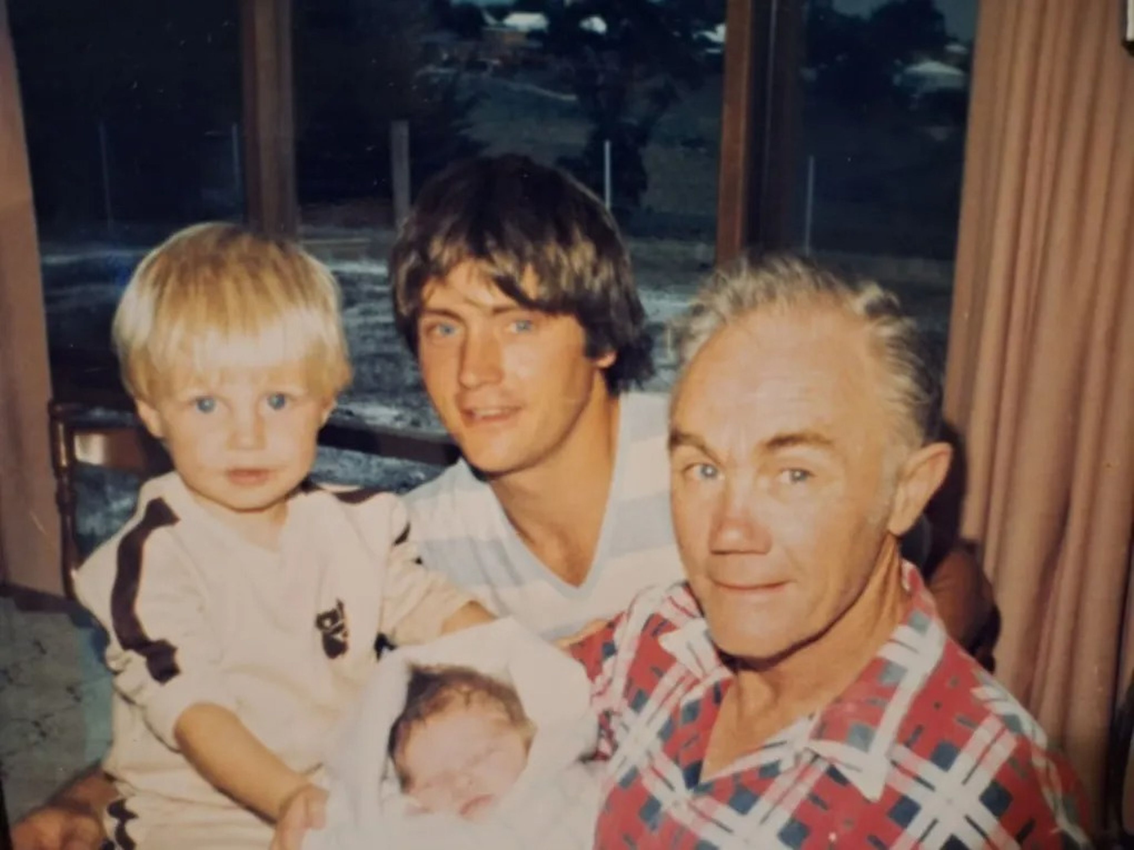 John Salton (middle) with his father (right) and his two kids.