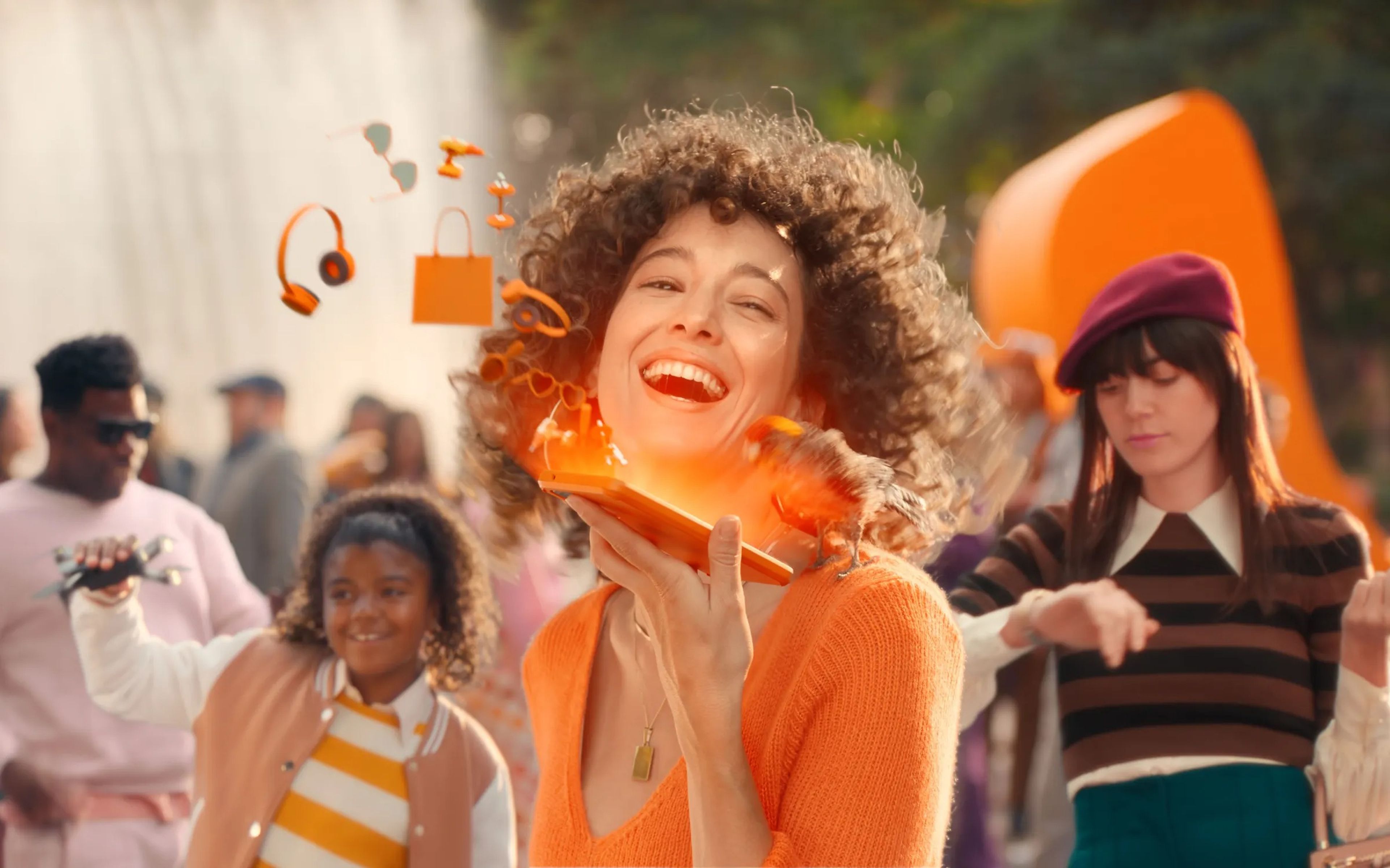 A woman dressed in orange in an ad for Temu