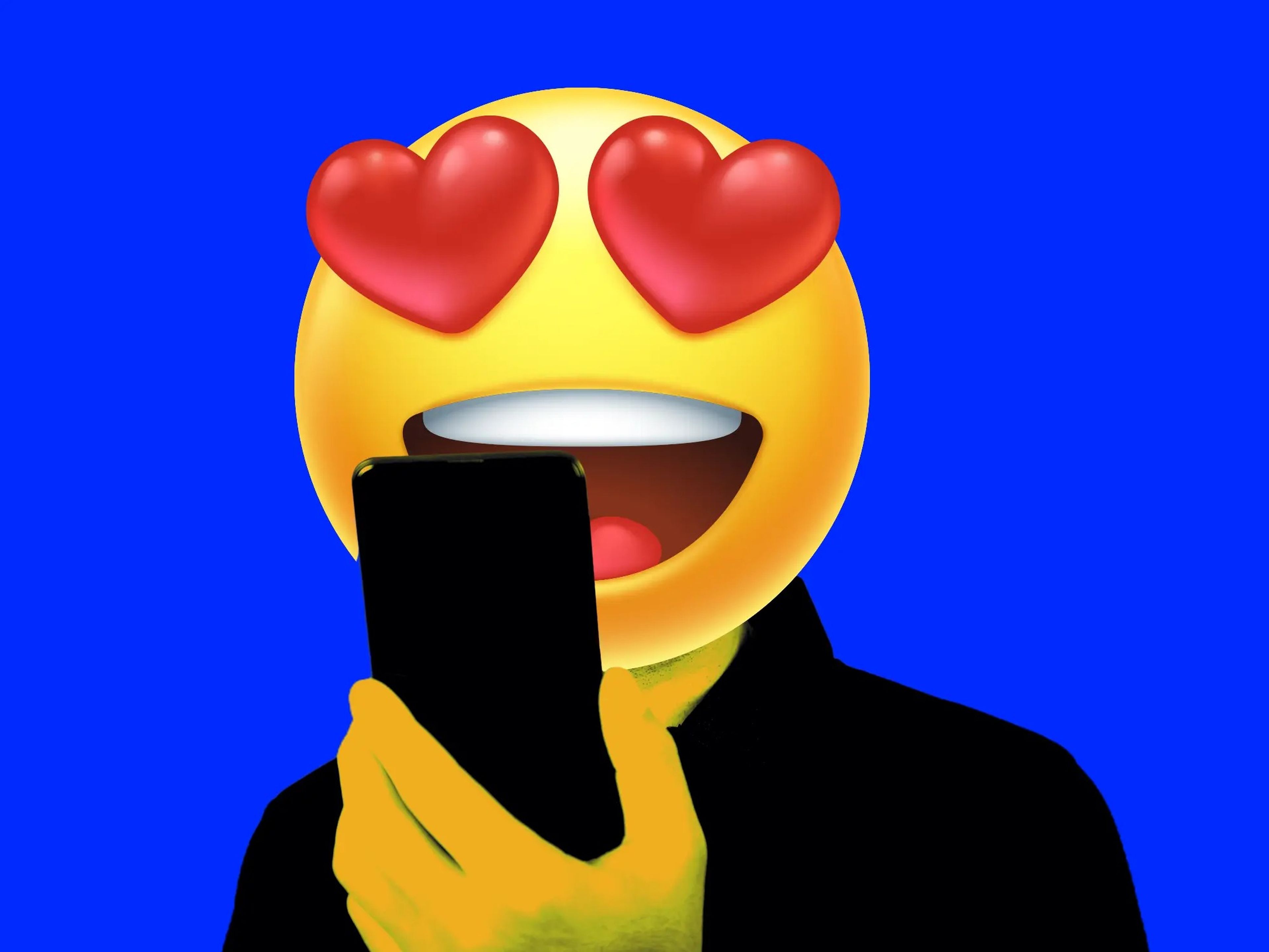 A heart eyes emoji looking at a phone