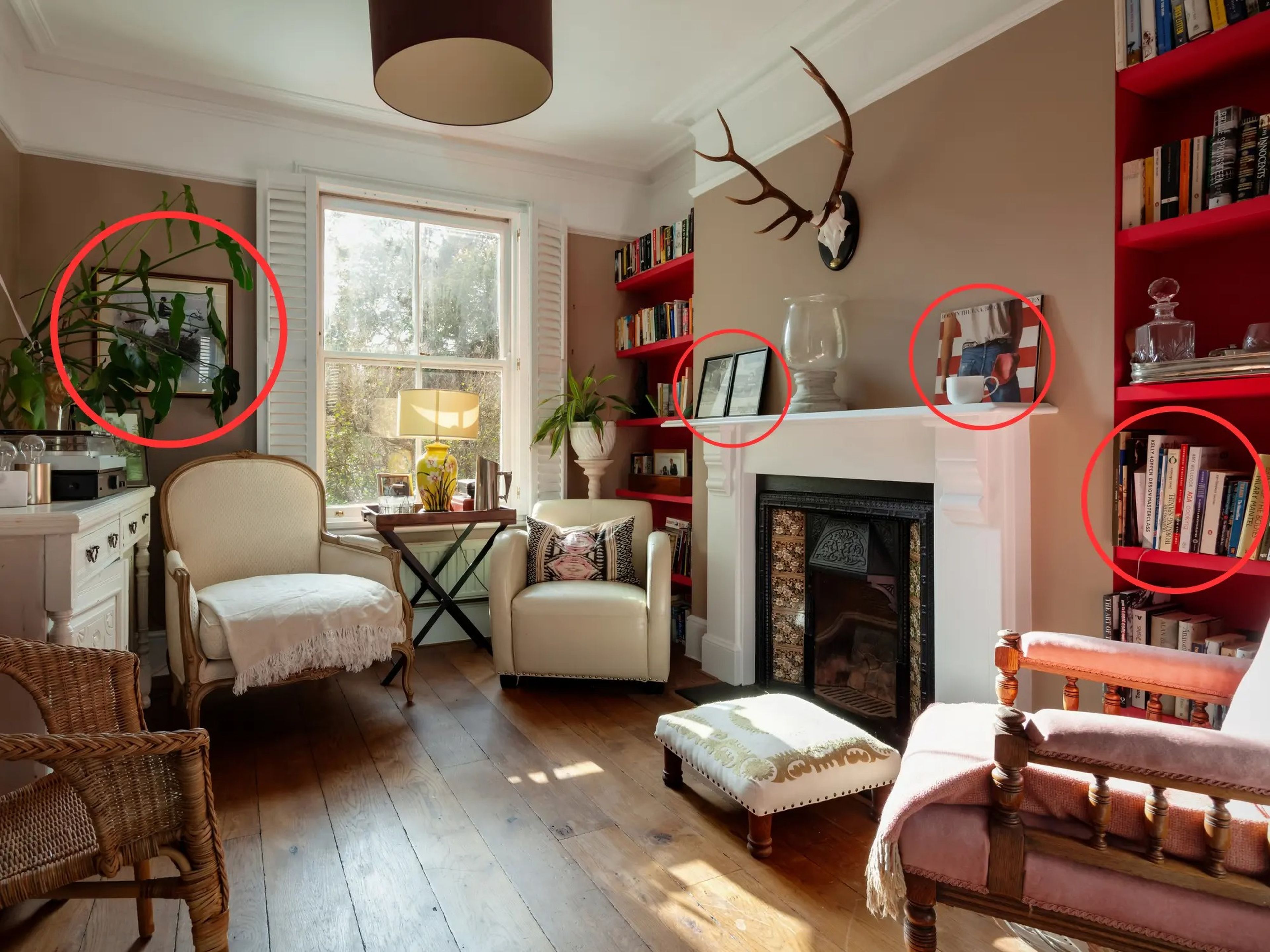 a living room with clutter circled in red