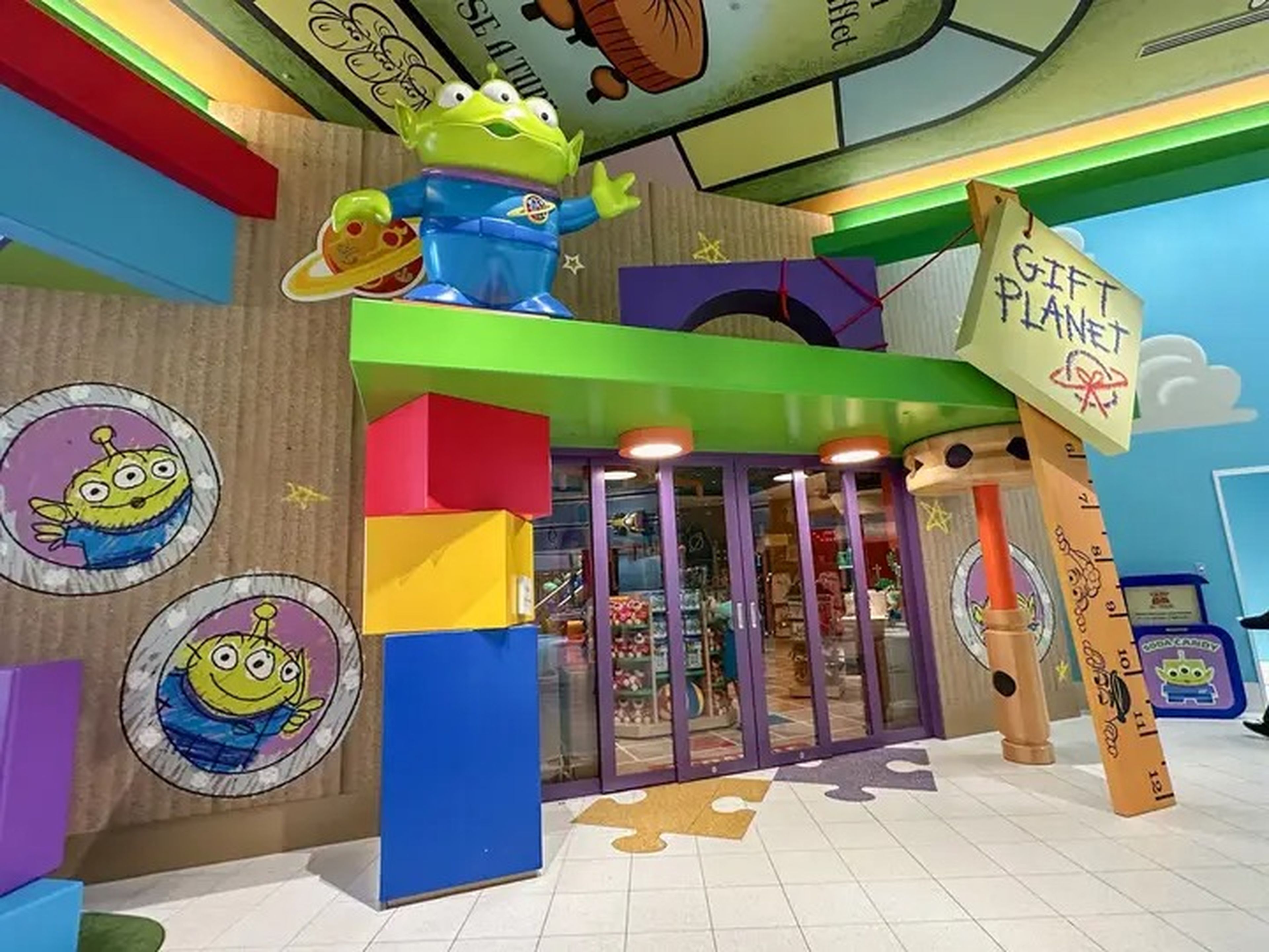 The exterior of the gift shop at the Toy Story Hotel in Tokyo showing a sign that reads, "Gift Planet."