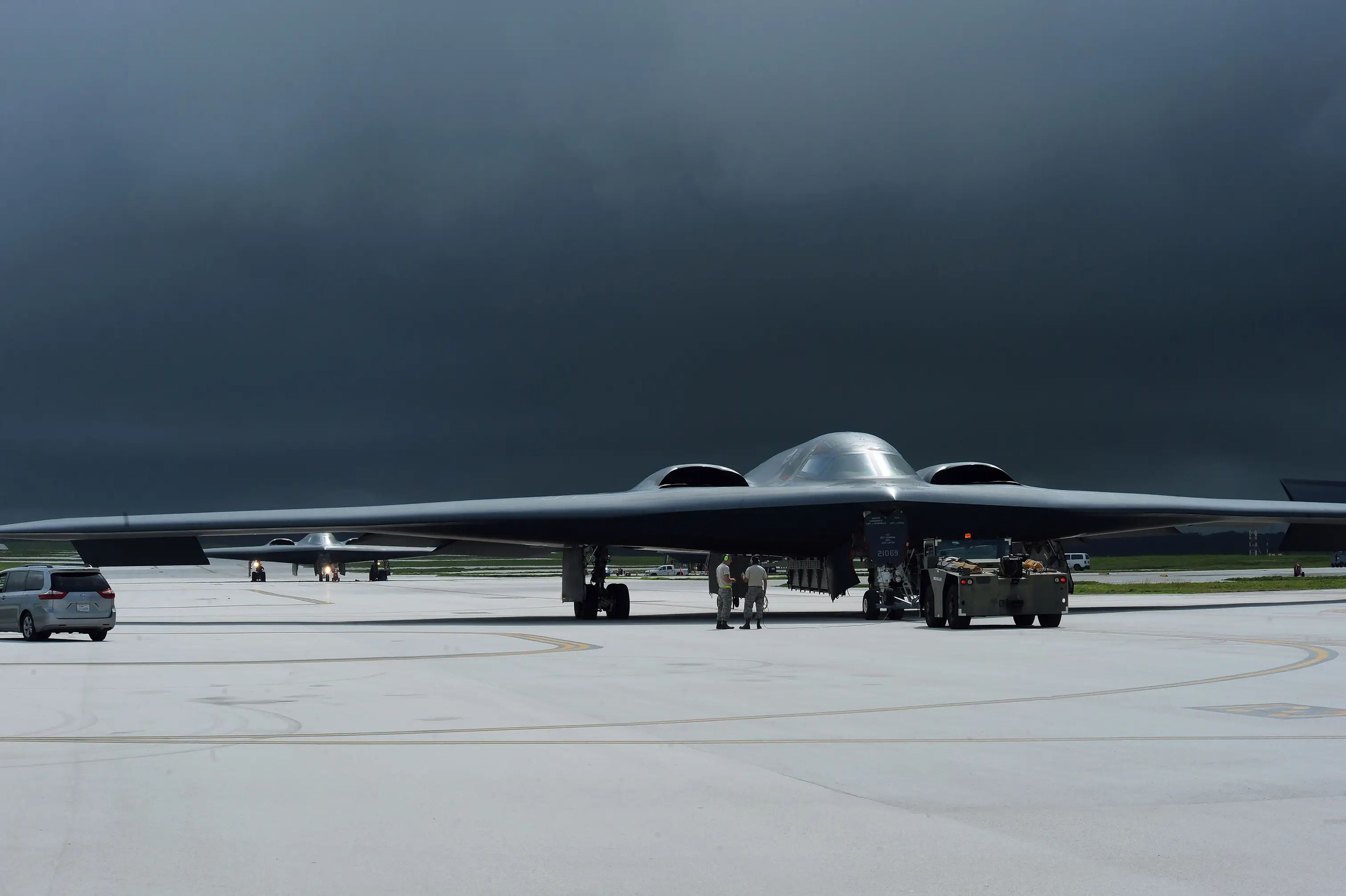 Multiple B-2 Spirits land for aircraft recovery as storm clouds gather Aug. 24, 2016, at Andersen Air Force Base, Guam.