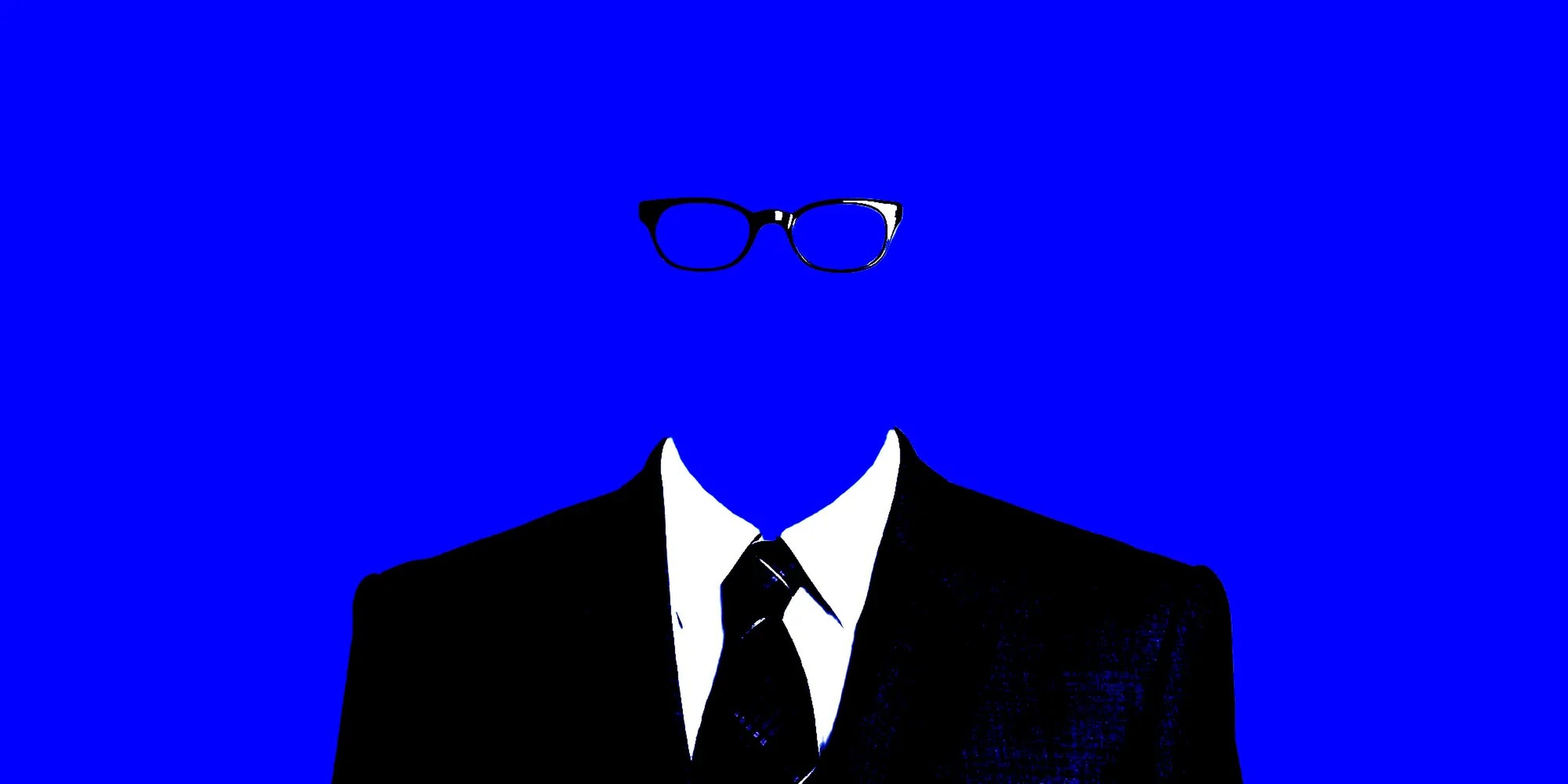 A suit and glasses with no body