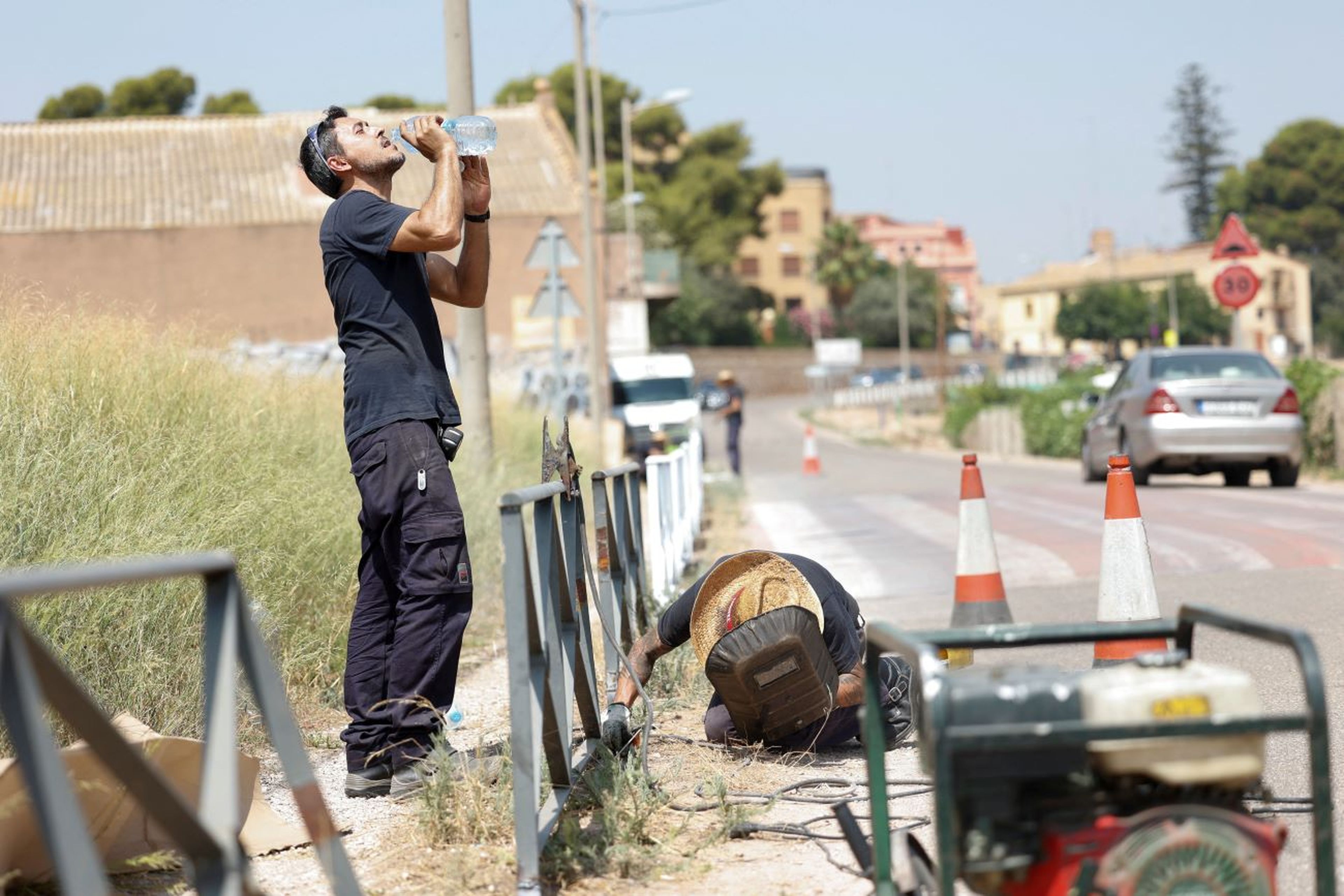 Trabajador al aire libre, ola de calor, España