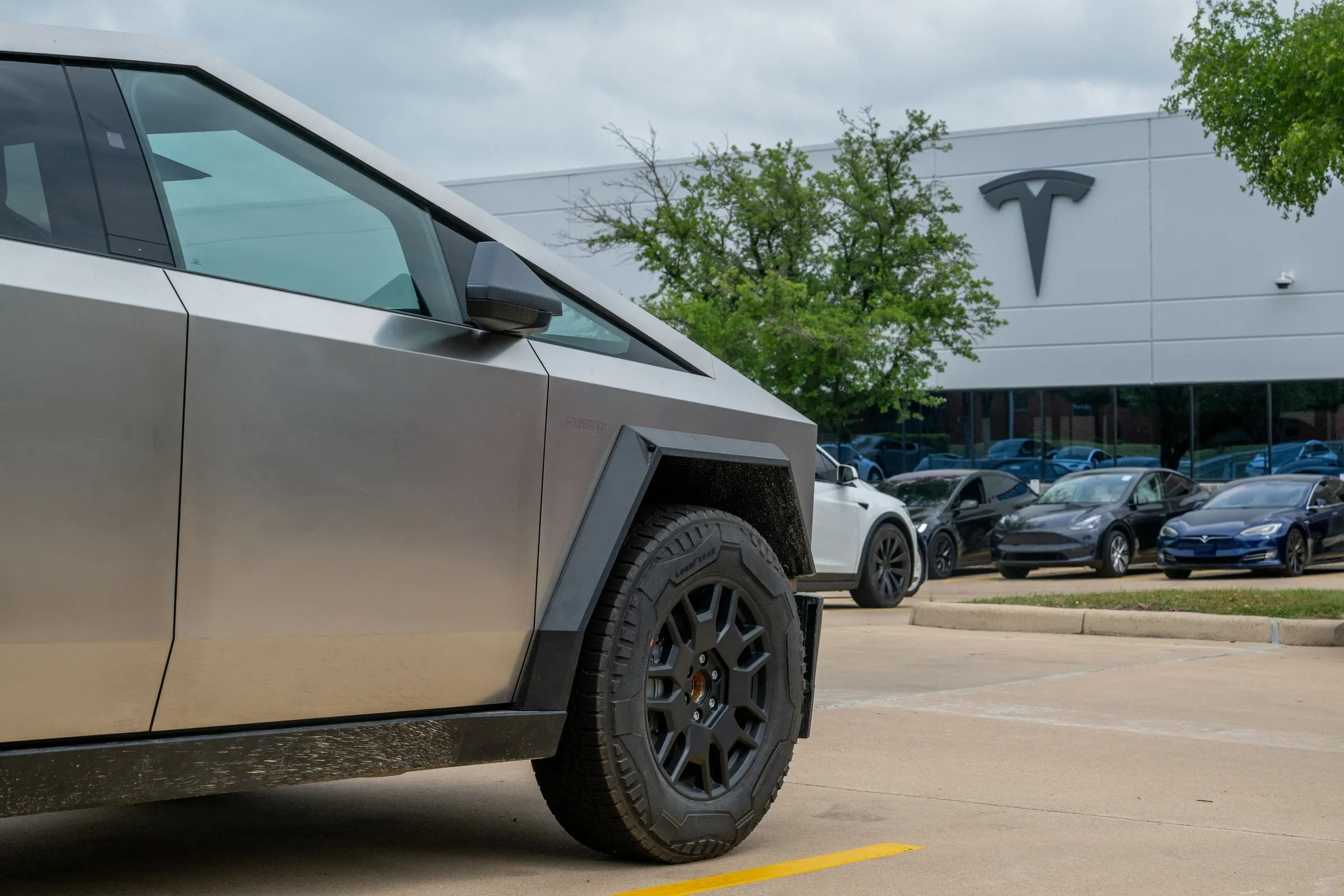 A Tesla Cybertruck sitting on a lot at a Tesla dealership in Austin on April 15, 2024.