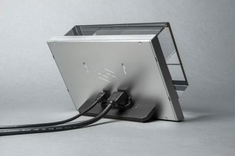 It uses a USB cable for power and an HDMI cable for video.
