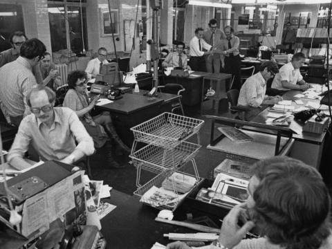 Of course, the prevailing dress code of a specific workplace was still largely dependent on the nature of the workplace itself. You'd notice major differences between, say, how people dressed in a newsroom and how people dressed