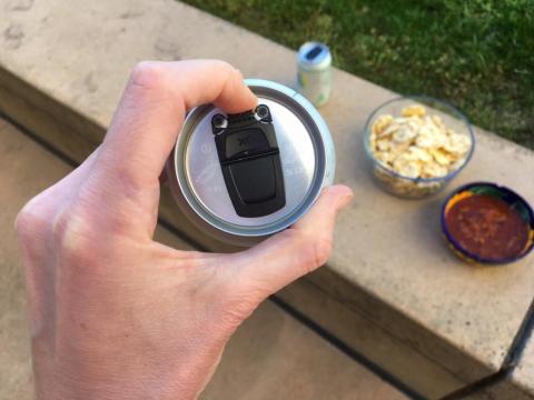 The drink is made in special cans that require a little finagling to get right — you pop the tab at the top, then slide to open.