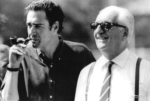 Enzo Ferrari, right.