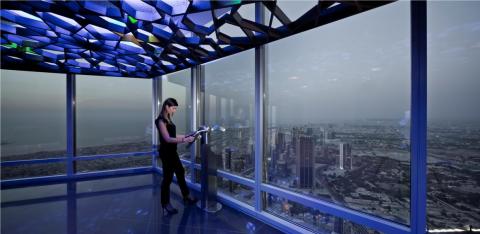 Including the antennae, the tower stands 2,717 feet tall, making it the tallest building in the world. Inside, there are residential apartments, eight hotels, shops, restaurants, and offices. Here's the view from the observation