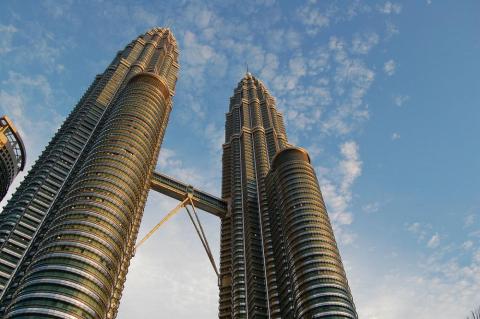 The Petronas Twin Towers, located in Malaysia, was constructed in 1999.