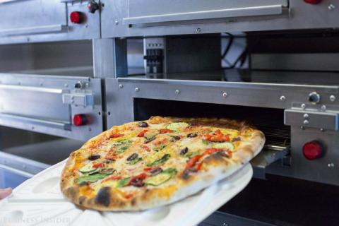 The delivery truck is retrofitted with six Welbilt ovens that can cook up to 70 pizzas per hour.