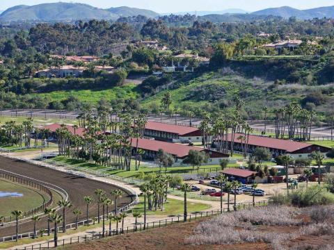 In California, he owns the 228-acre Rancho Paseana, which he purchased for $18 million. It includes a racetrack, orchard, and five barns.