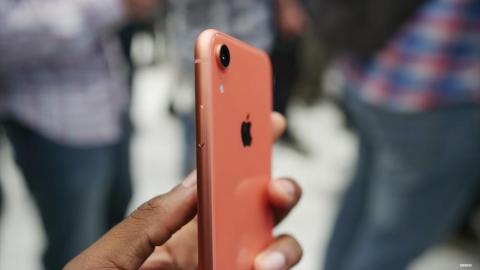 Here it is at an angle. The metal edges almost look like copper, while the back has more of a salmon color.