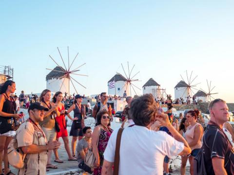 "Outside of the beaches, the main thing to see in Mykonos is the windmills that sit above the Hora, or main town of the island," Jacobs wrote. "But during sunset, and when the cruise-shippers come in, the area is swarmed with