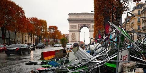 Recent damage from riot protests against the cost of living in Paris. Recent damage from riot protests against the cost of living in Paris.