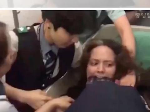 An American woman was dragged off a Korean Air flight after she commandeered a business class seat (July)