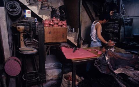 This rubber factory was run entirely by two men.