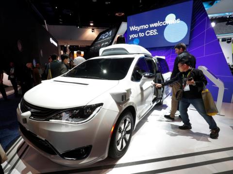 A Waymo autonomous vehicle (formerly the Google self-driving car project) is displayed at the Fiat Chrysler Automobiles booth during the 2019 CES in Las Vegas, Nevada, U.S. January 8, 2019.
