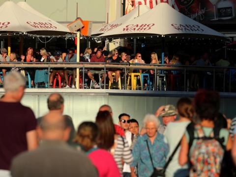 Visitors fill Las Vegas Boulevard, otherwise known as "The Strip." Visitors fill Las Vegas Boulevard, otherwise known as "The Strip."