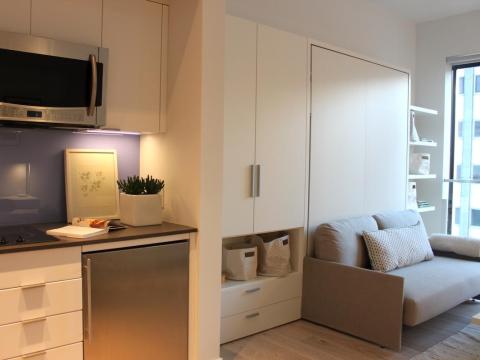 She found the room to be beautifully decorated and designed, and said "it'd be easy to live here" if she could afford the monthly rent.