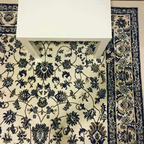 There's a phone hidden somewhere in this picture.